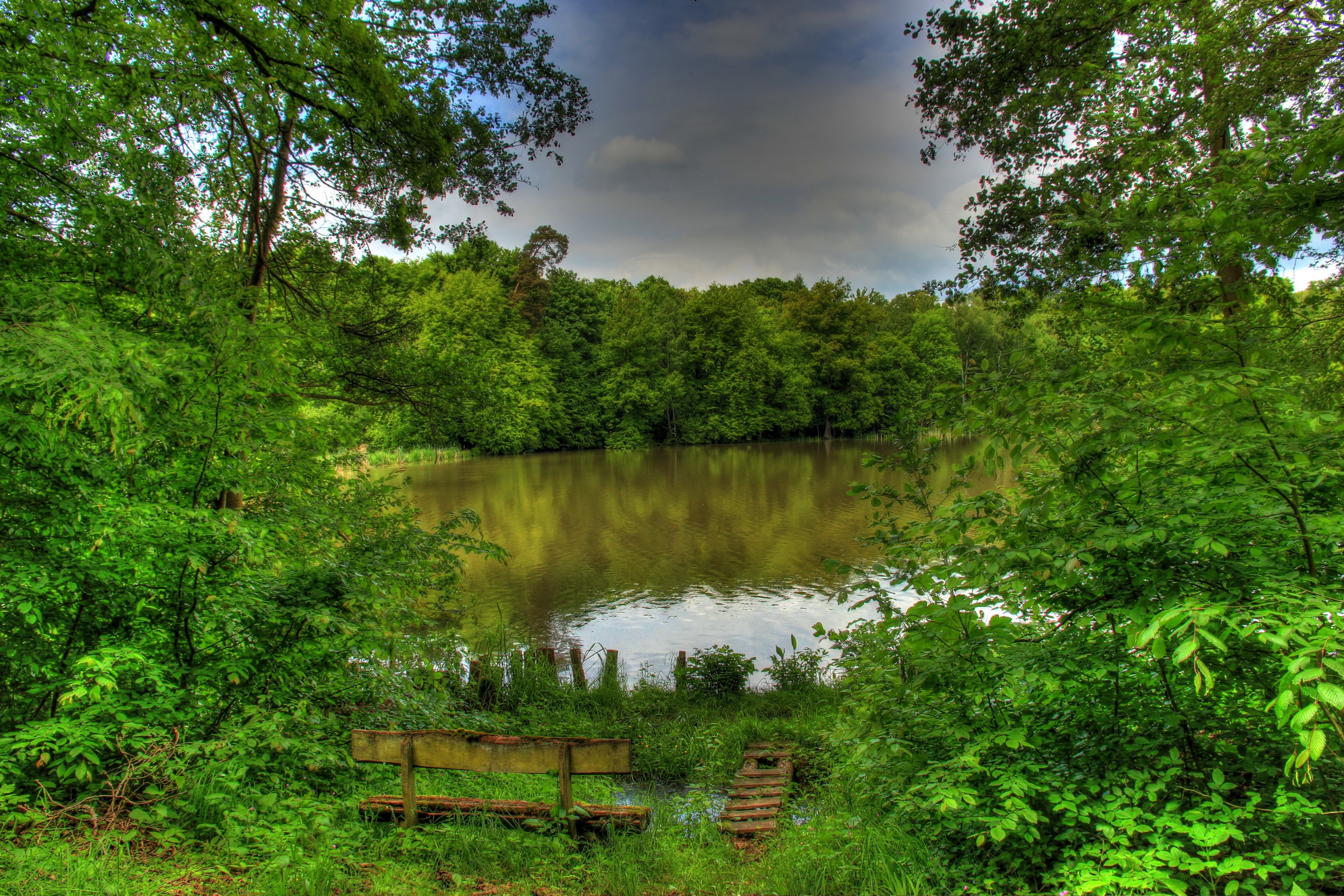 Bench by a lake in Hungen, Germany HD Wallpaper