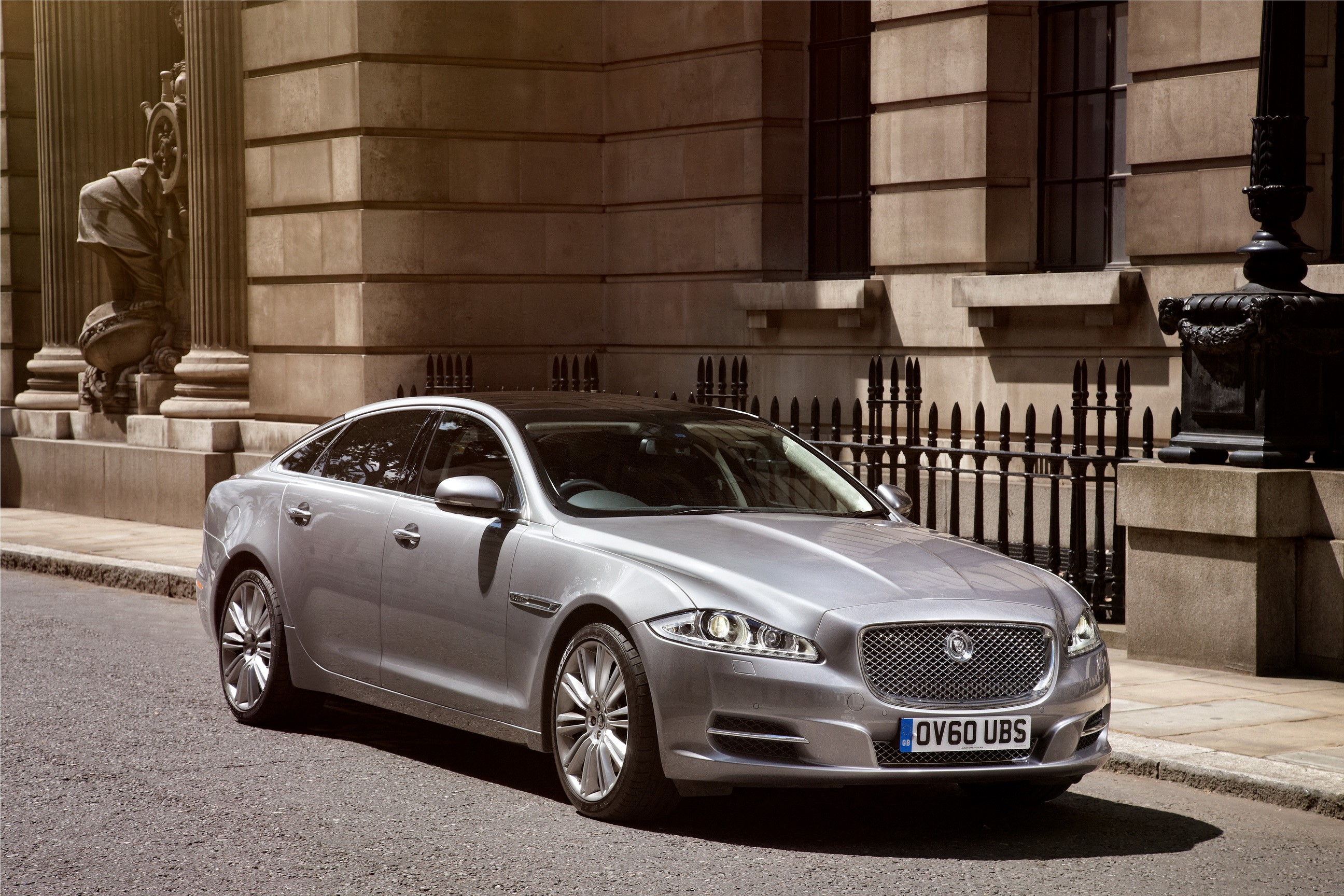 Silver 2012 Jaguar XJ LWB parked on a street HD Wallpaper