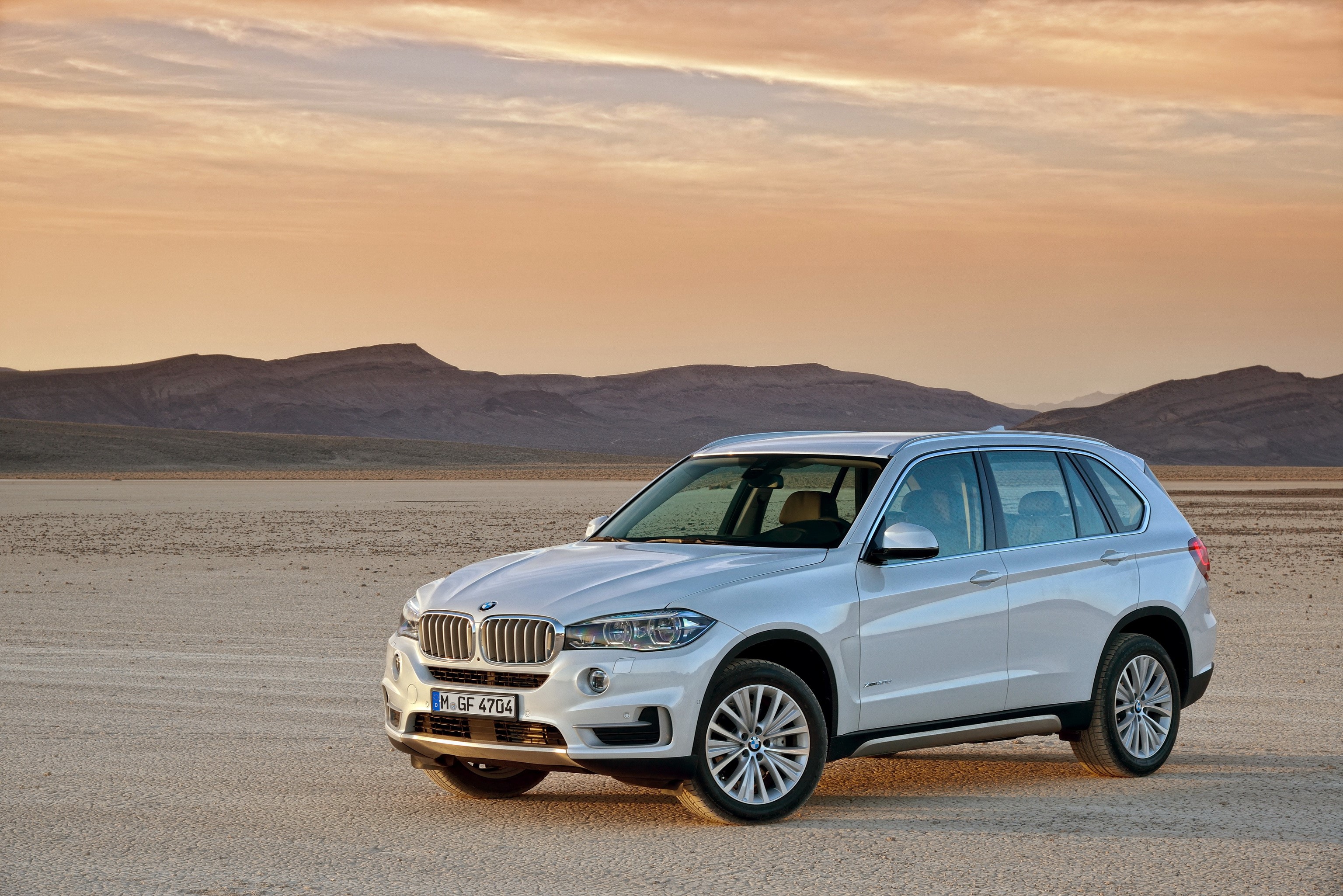 White 2013 BMW X5 in a desert landscape HD Wallpaper