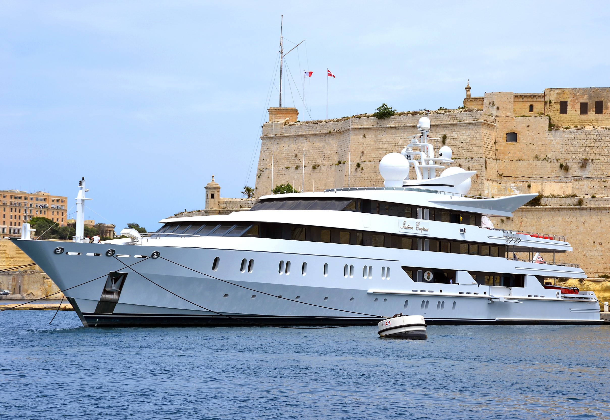 Indian Empress Yacht docked near Malta fortifications HD Wallpaper