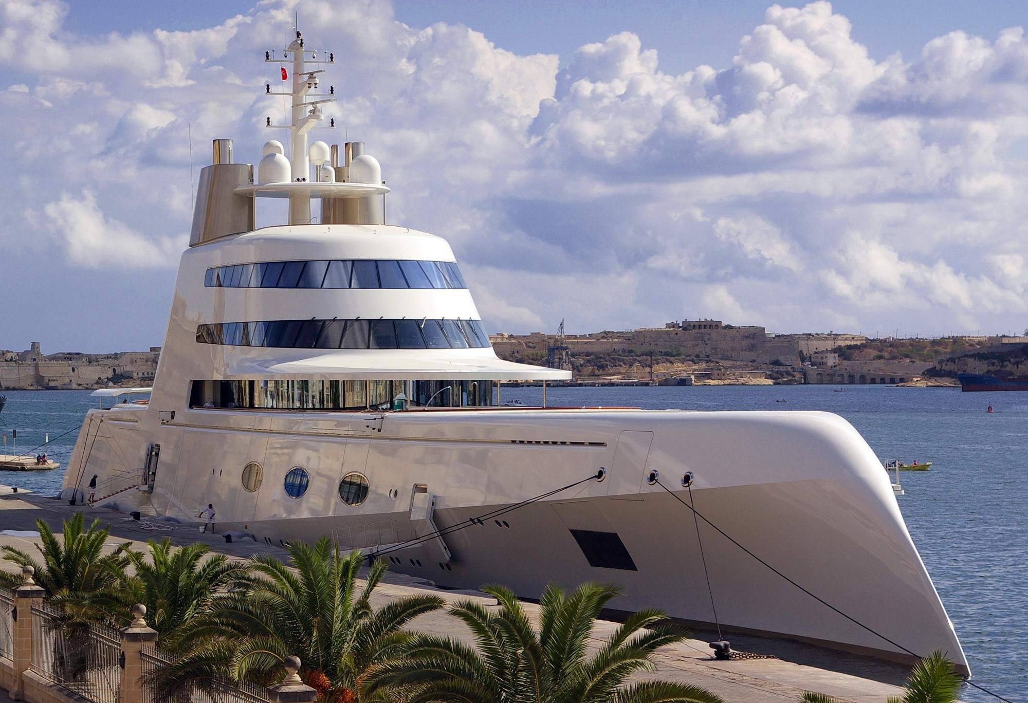 Superyacht A docked in a harbor with Malta in the background HD Wallpaper