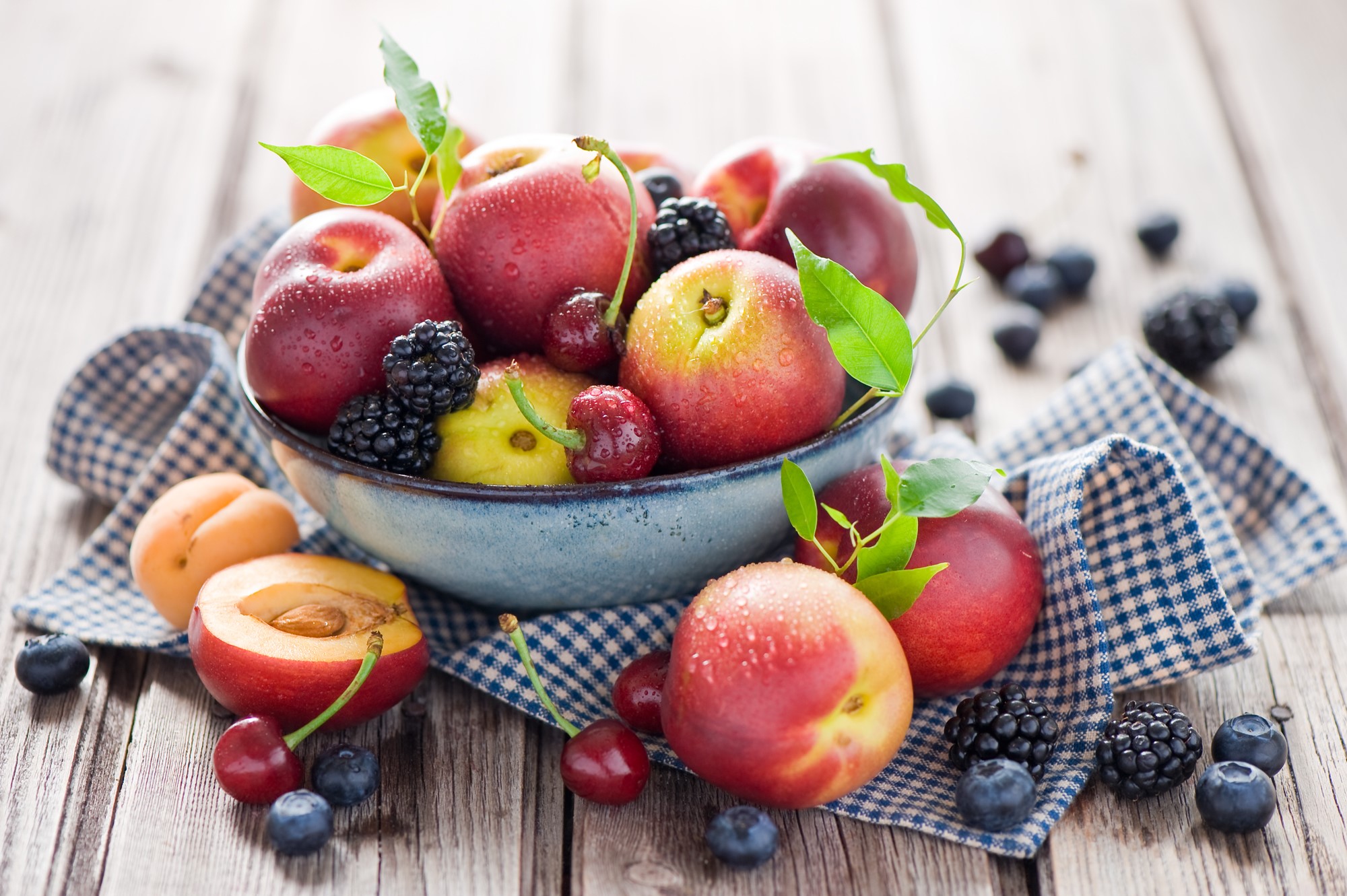 Bowl of fresh peaches, cherries, blackberries, and blueberries HD Wallpaper