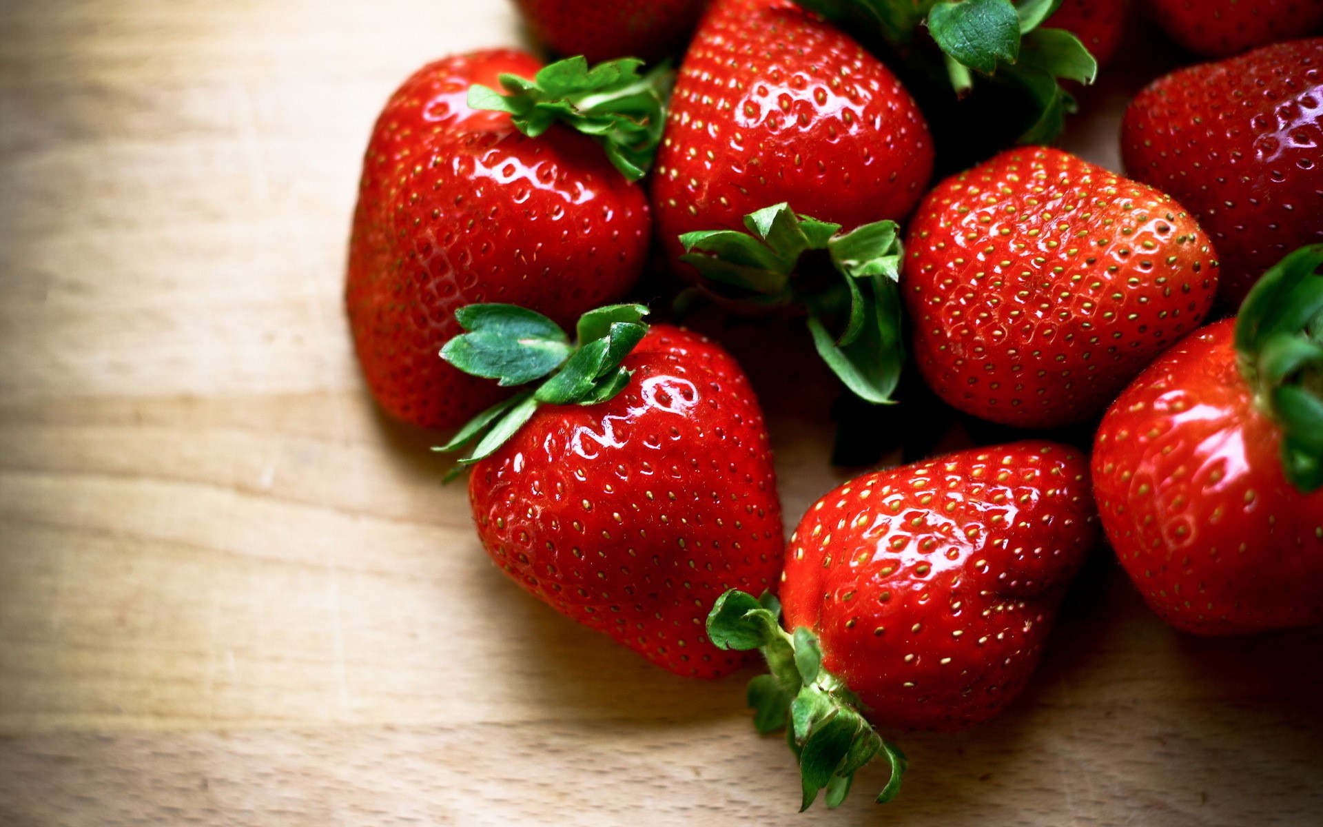 Fresh Strawberries on a Wooden Surface HD Wallpaper