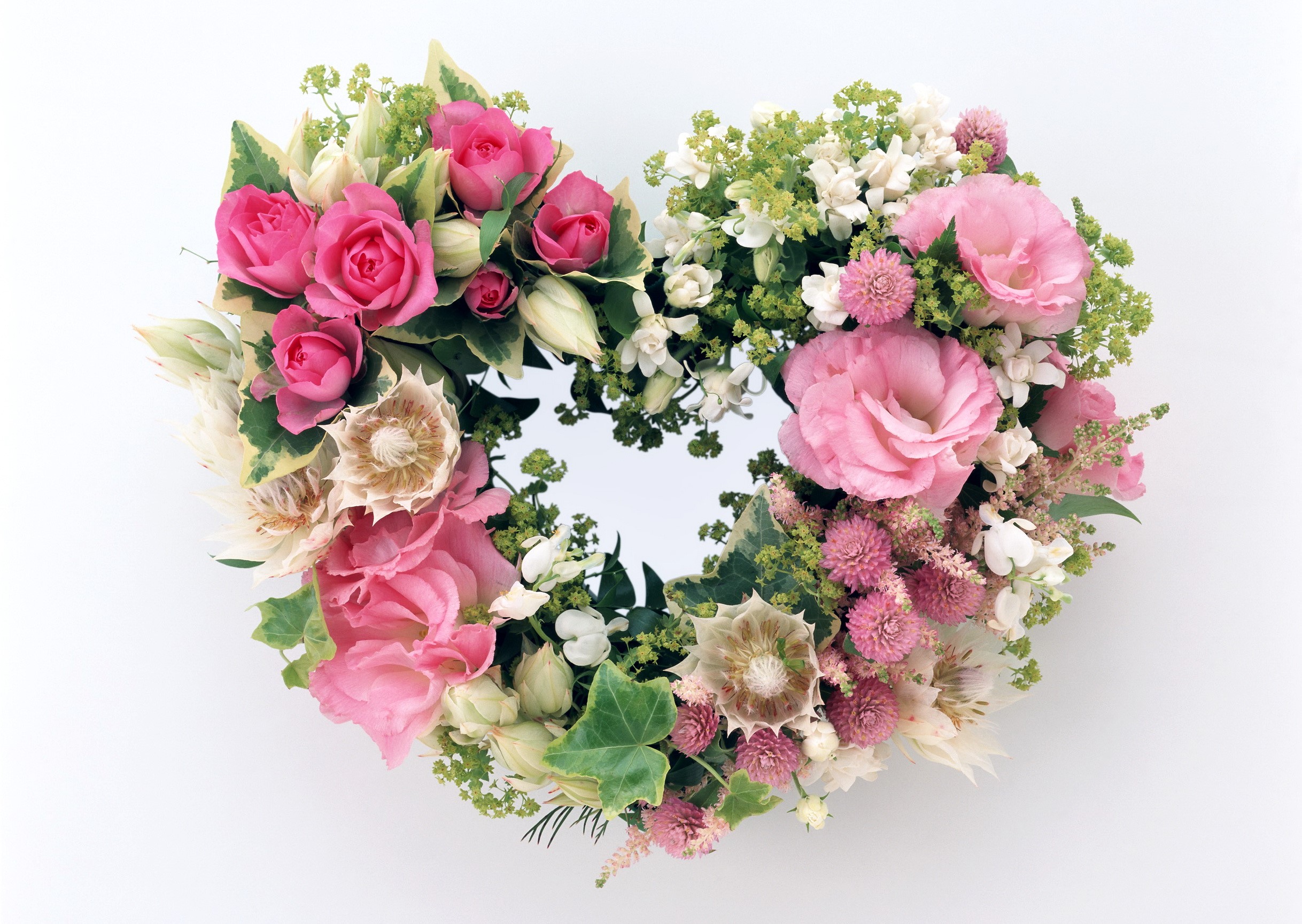 Heart-shaped floral arrangement with pink roses HD Wallpaper