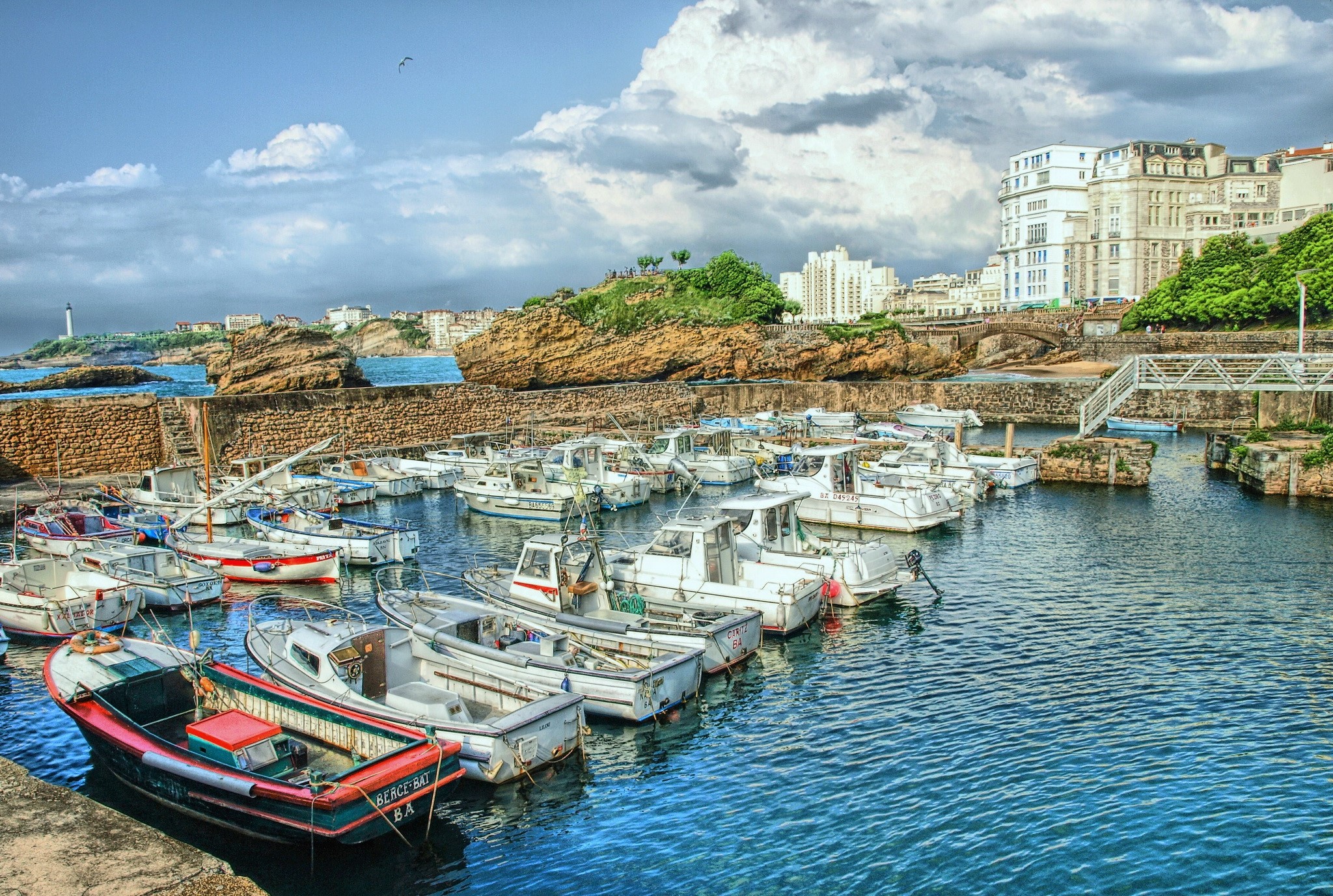 Boats docked in a harbor in Biarritz, France HD Wallpaper