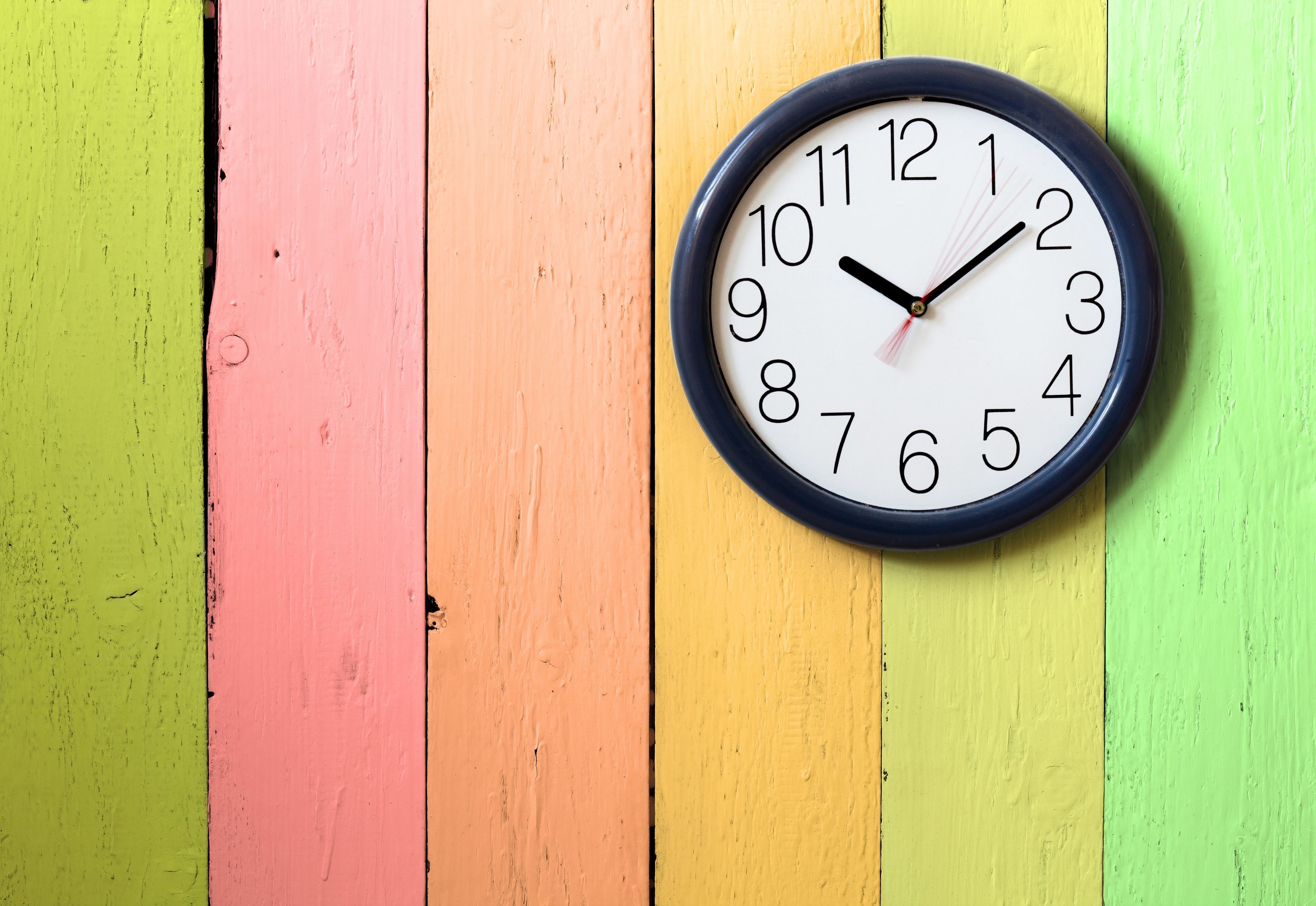 Clock on colorful wooden planks HD Wallpaper