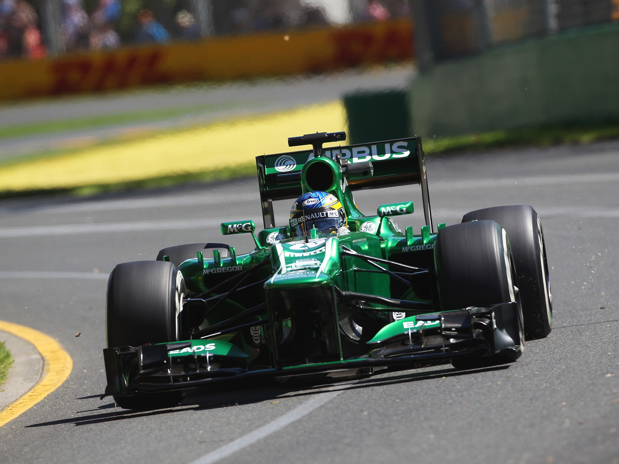 Green Formula 1 Car on Track HD Wallpaper