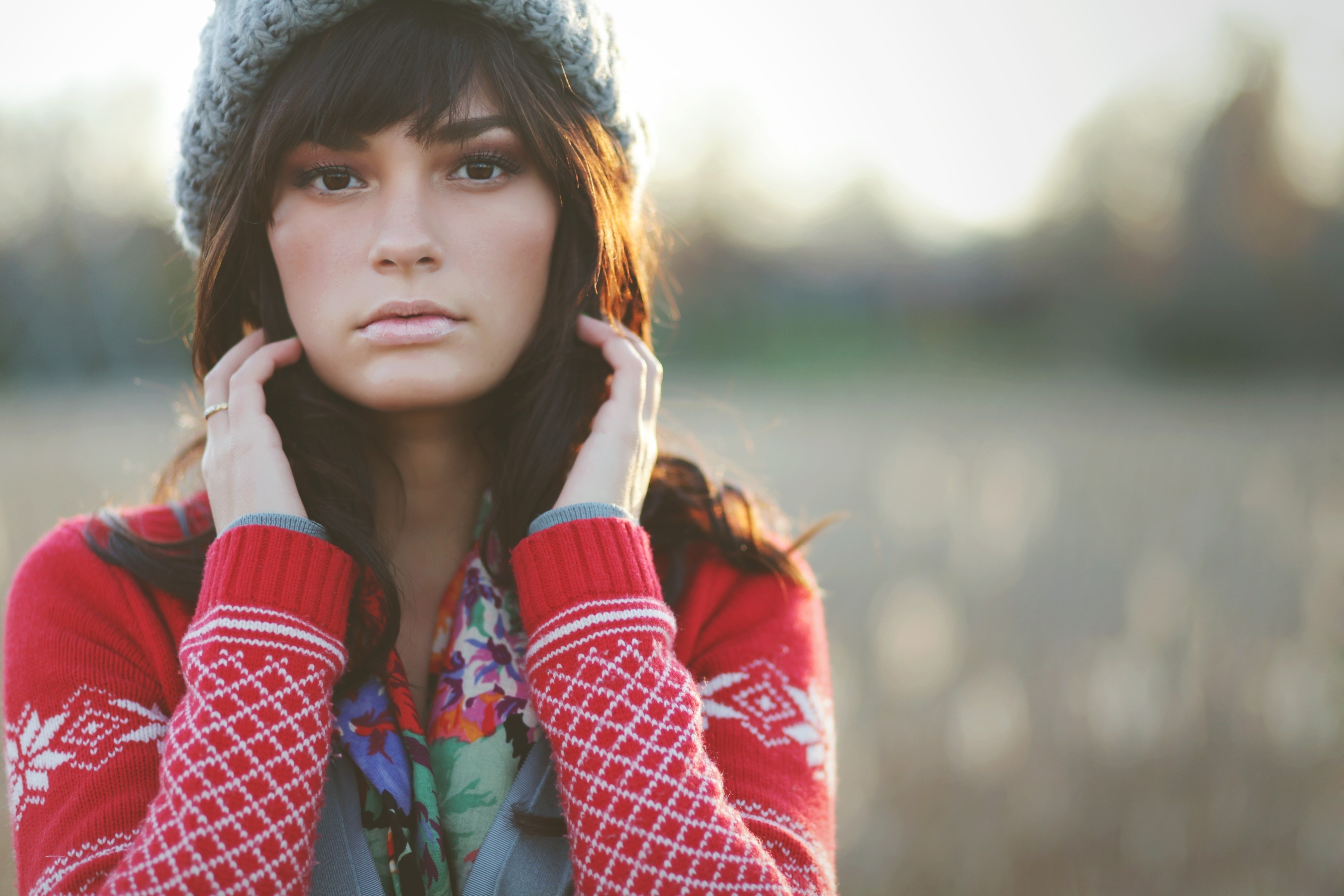 Brunette girl in winter hat and sweater HD Wallpaper