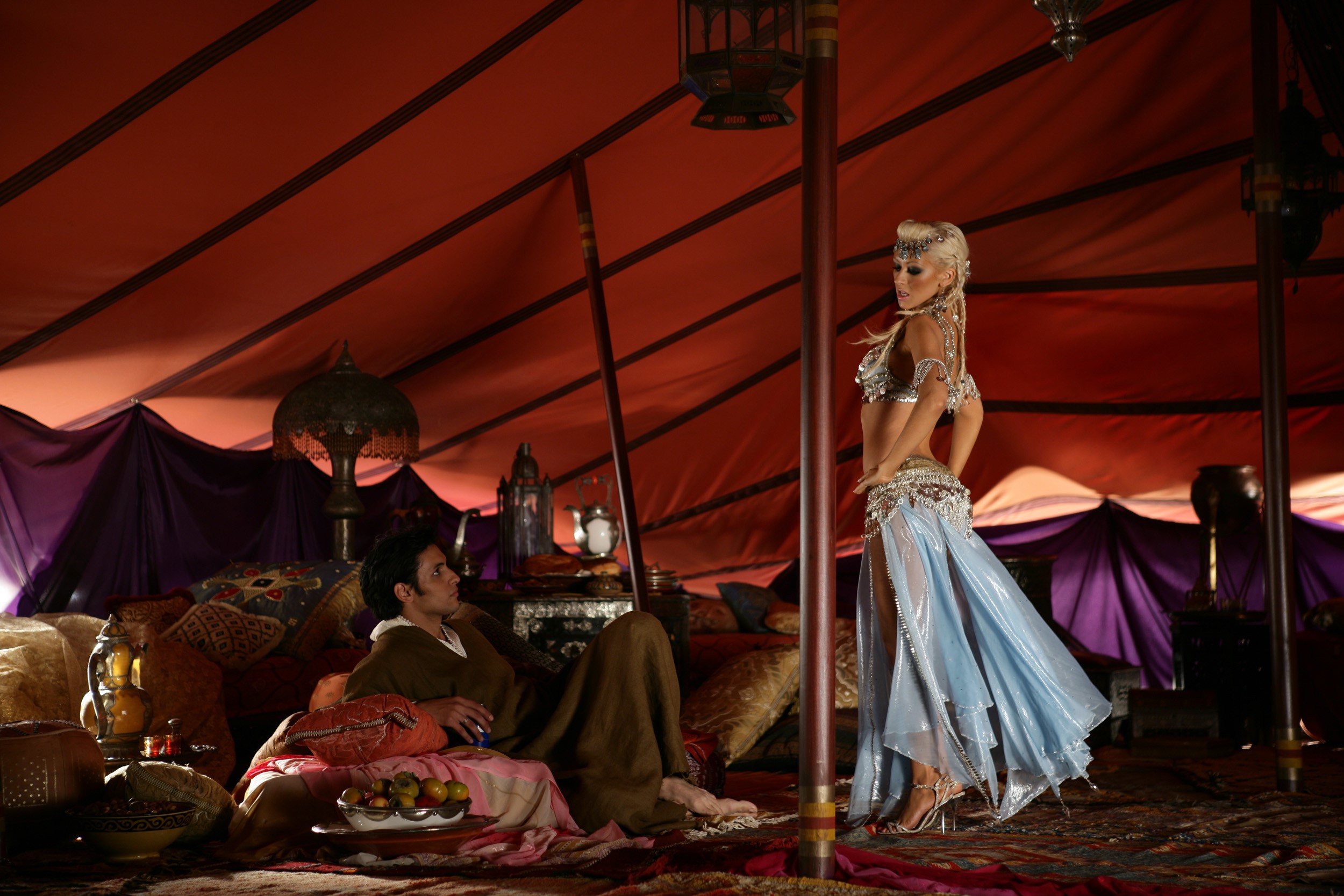 Christina Aguilera in a tent with a man HD Wallpaper