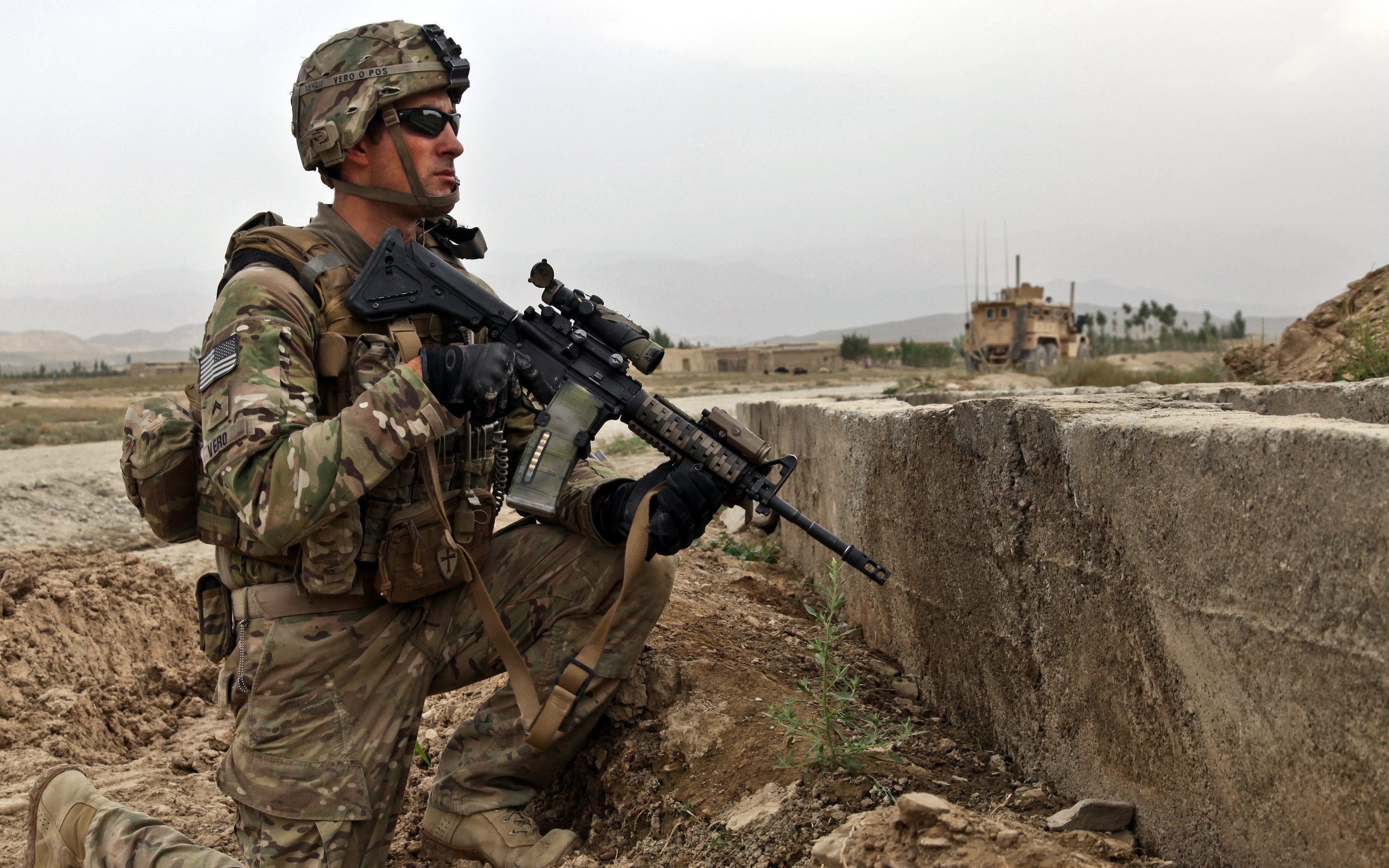 Soldier with Assault Rifle in Desert Landscape HD Wallpaper