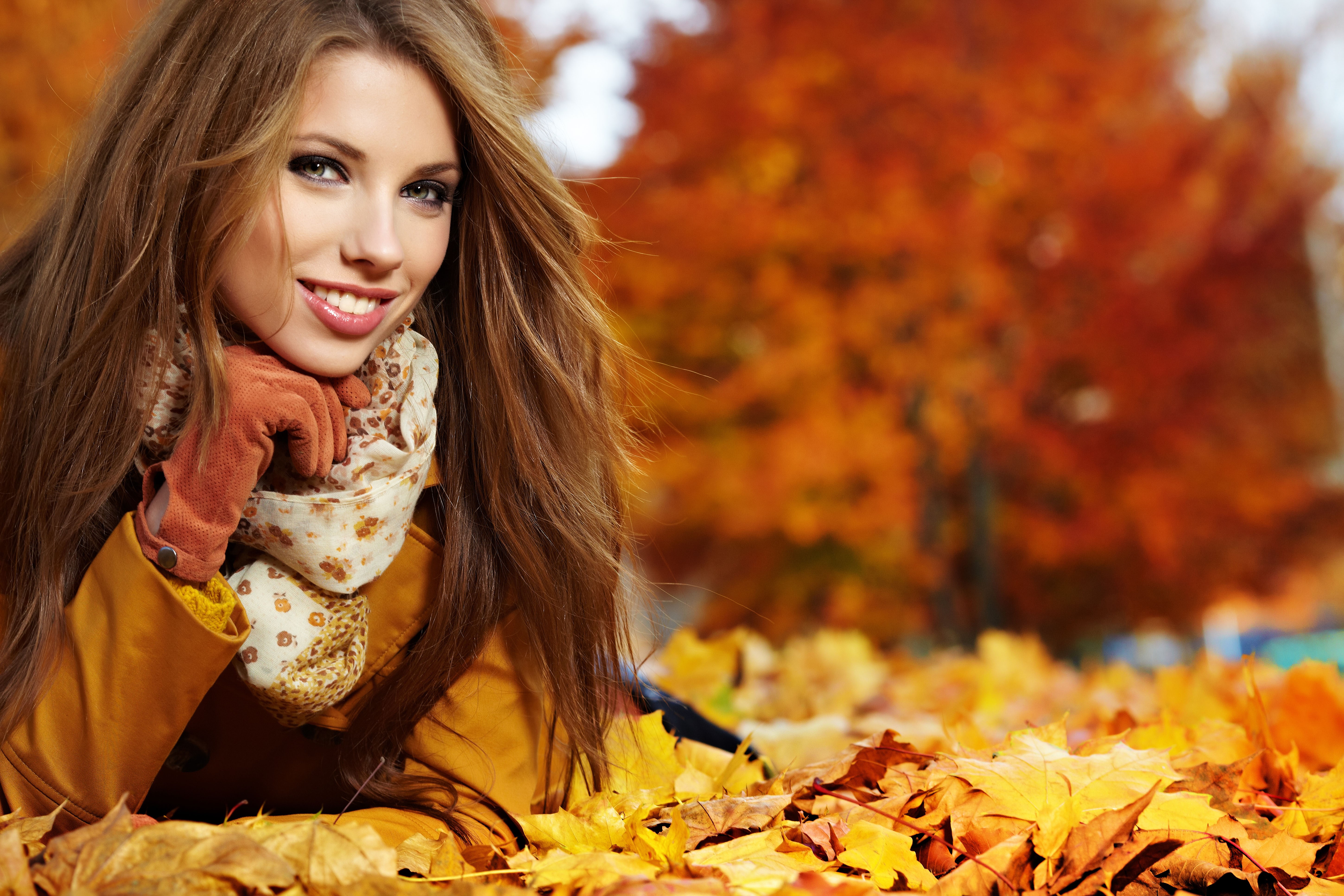 Woman in Autumn Foliage HD Wallpaper