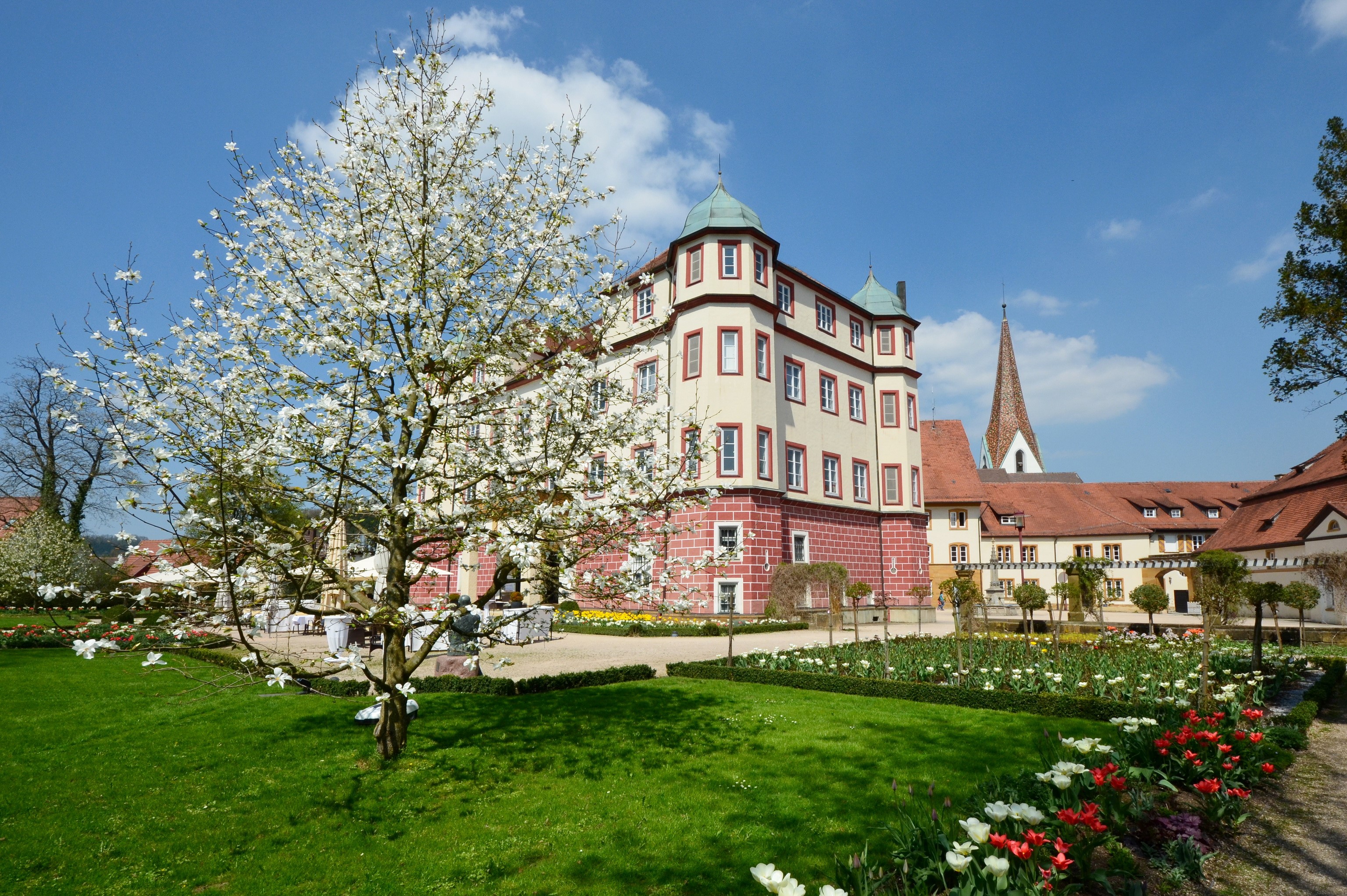 Schloss Donzdorf in Germany with blooming tree and garden HD Wallpaper