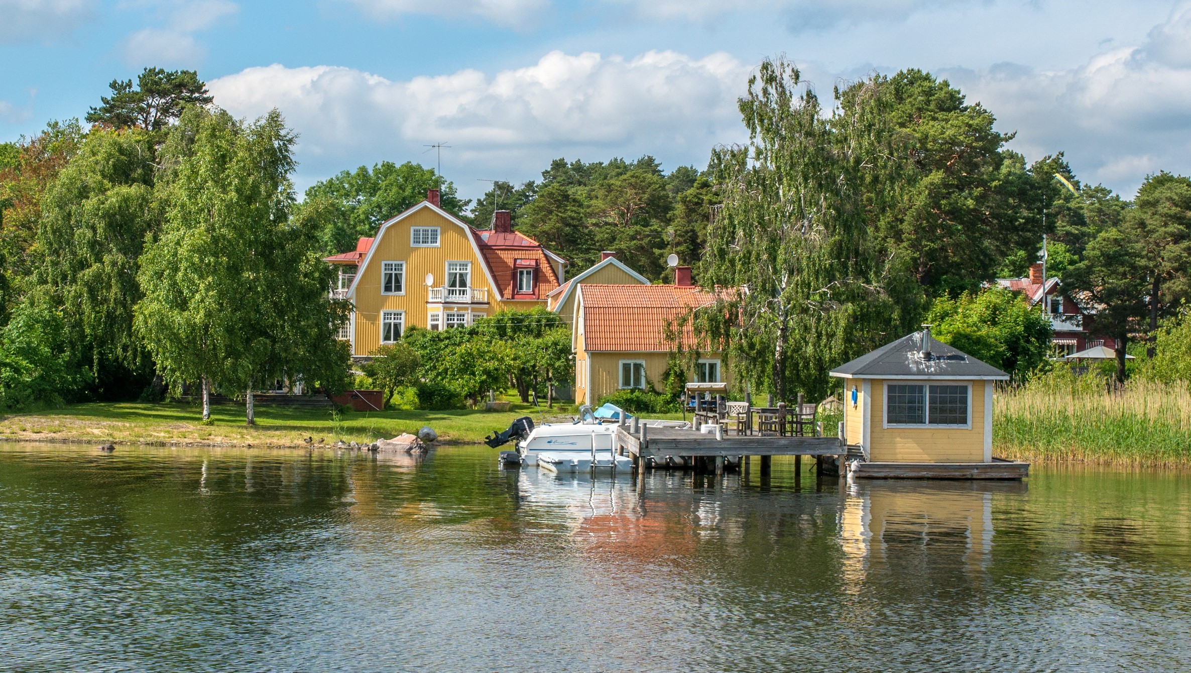Yellow houses on the coast of Vaxholm, Sweden HD Wallpaper