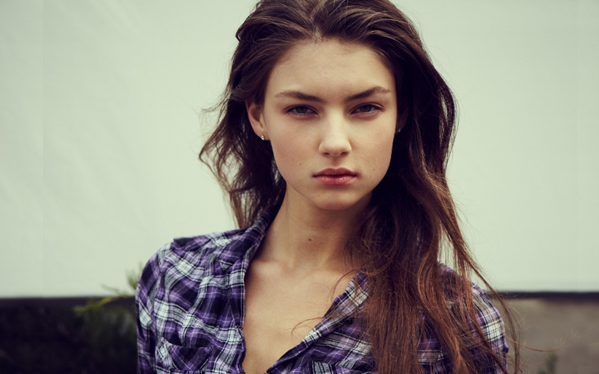 Woman with brown hair wearing a purple plaid shirt HD Wallpaper