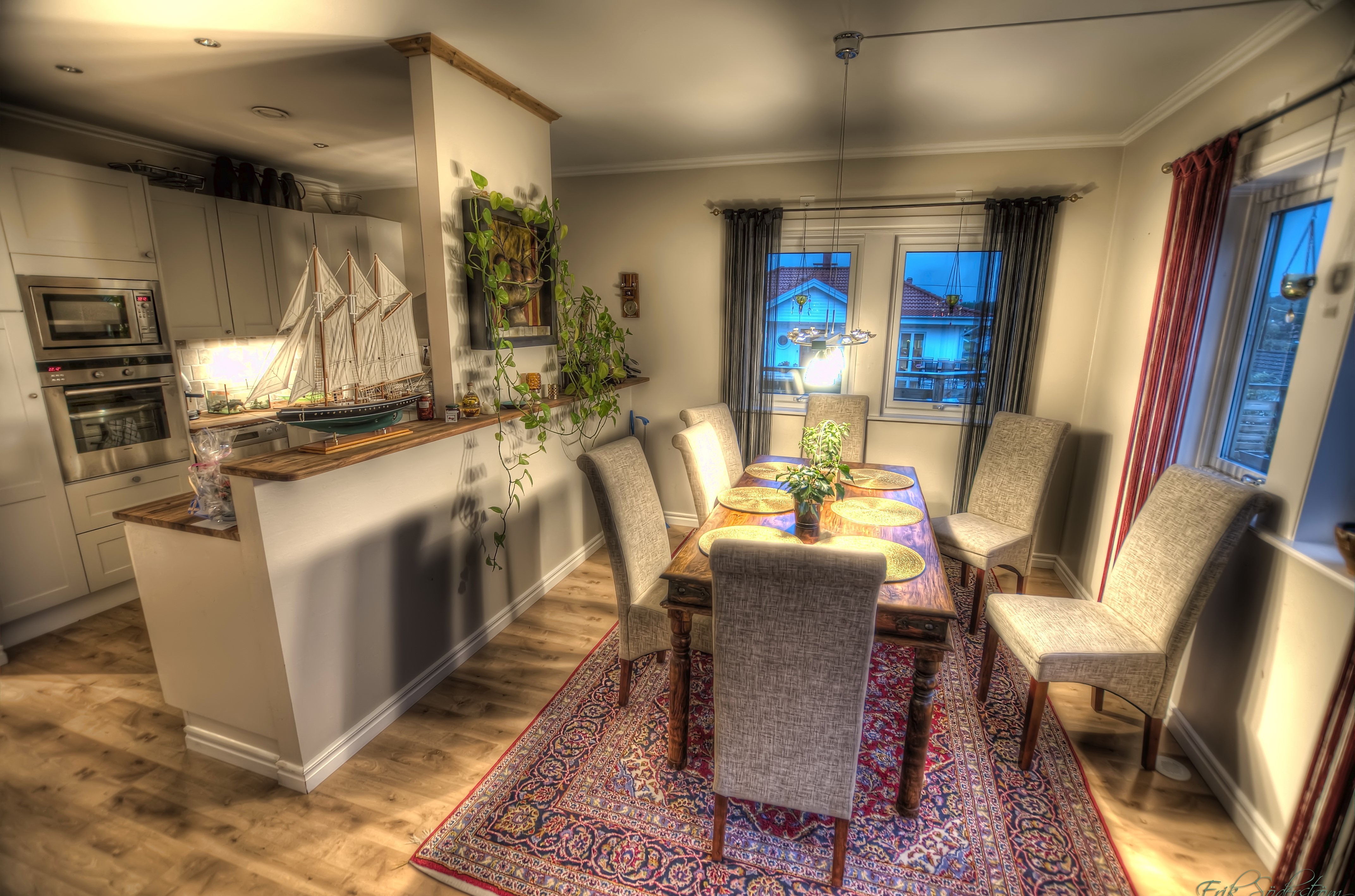 Dining room and kitchen with ship model HD Wallpaper