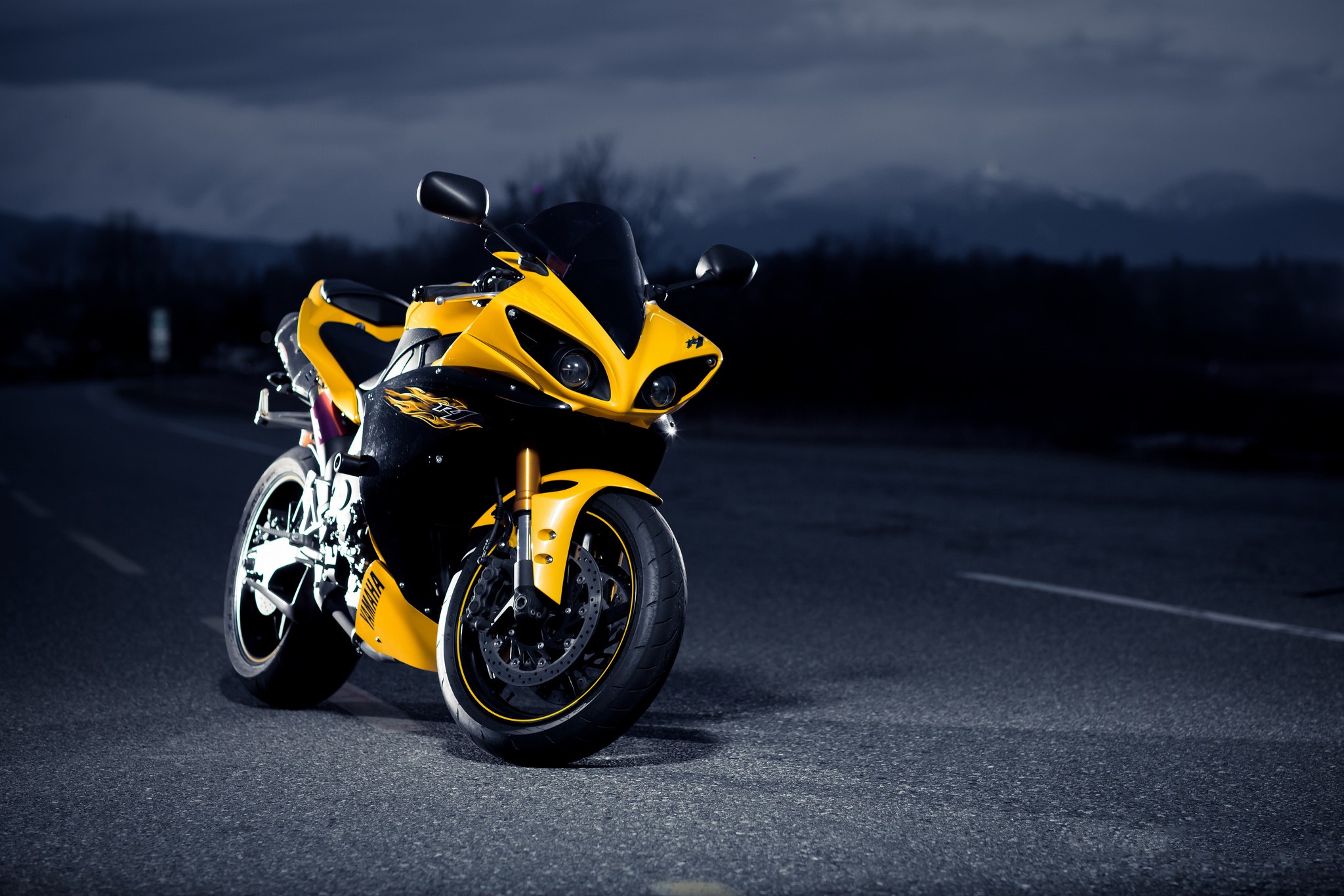 Yellow Yamaha R1 motorcycle at night on asphalt HD Wallpaper