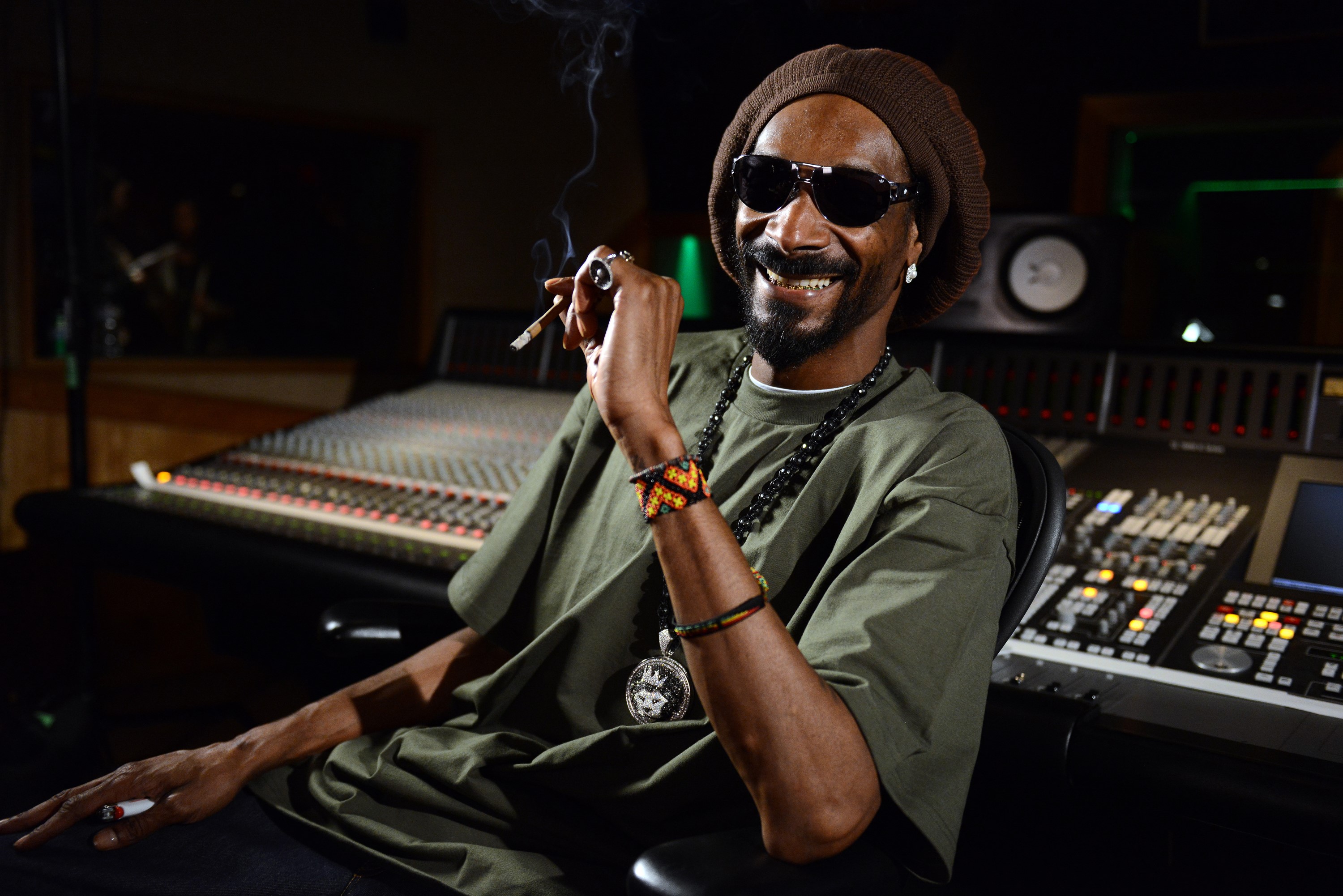 Snoop Dogg in a recording studio smoking HD Wallpaper