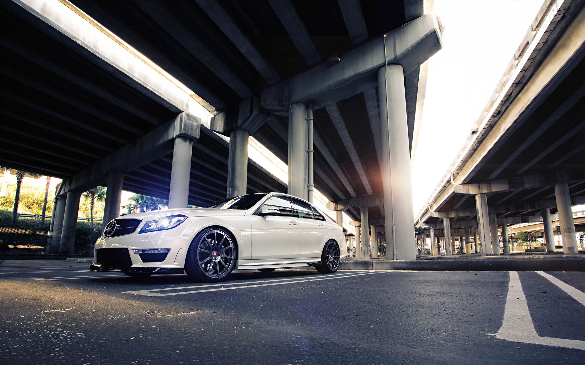 White Mercedes-Benz C63 AMG Sedan under Bridges HD Wallpaper