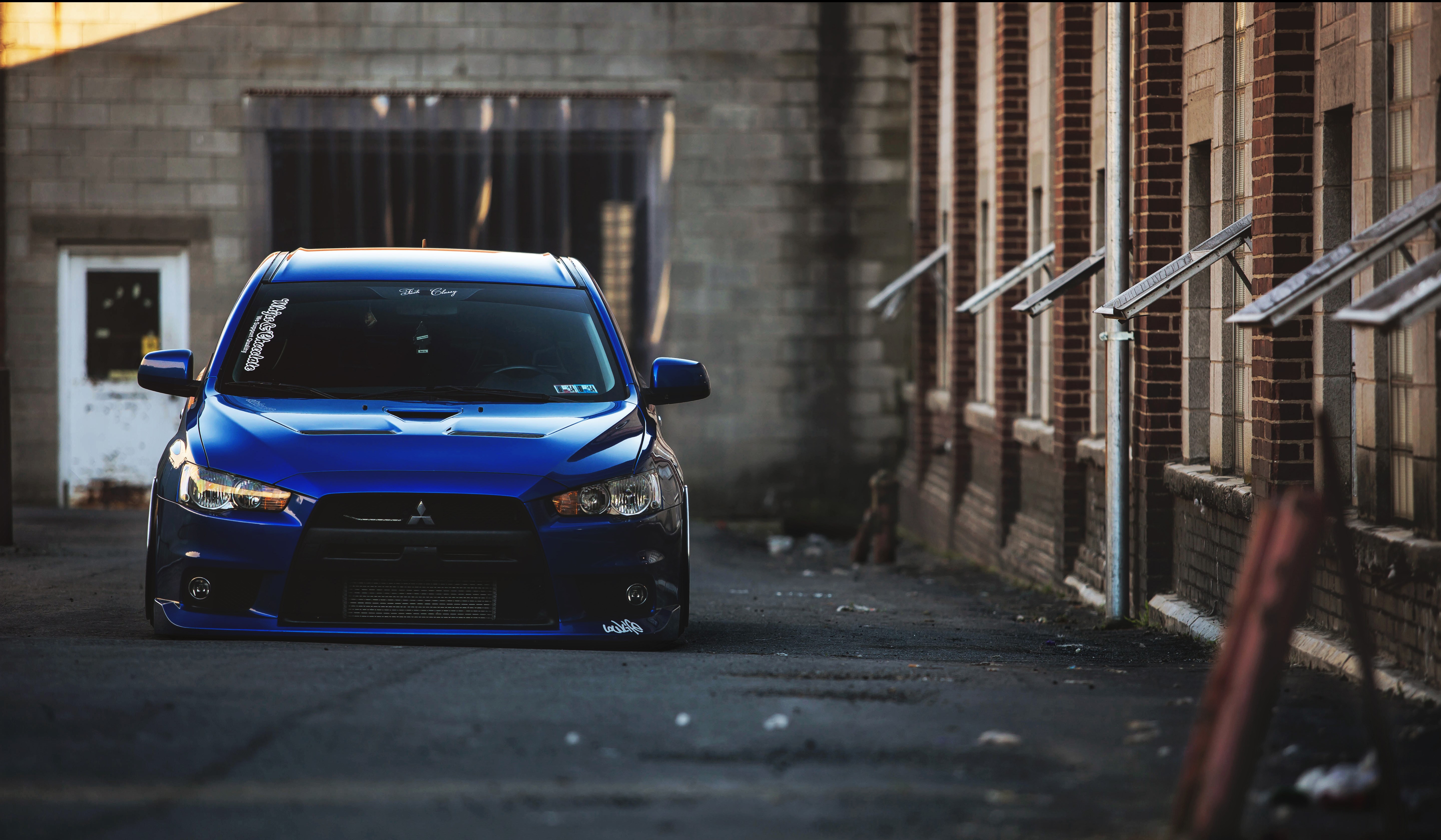 Blue Mitsubishi Lancer in Alley HD Wallpaper