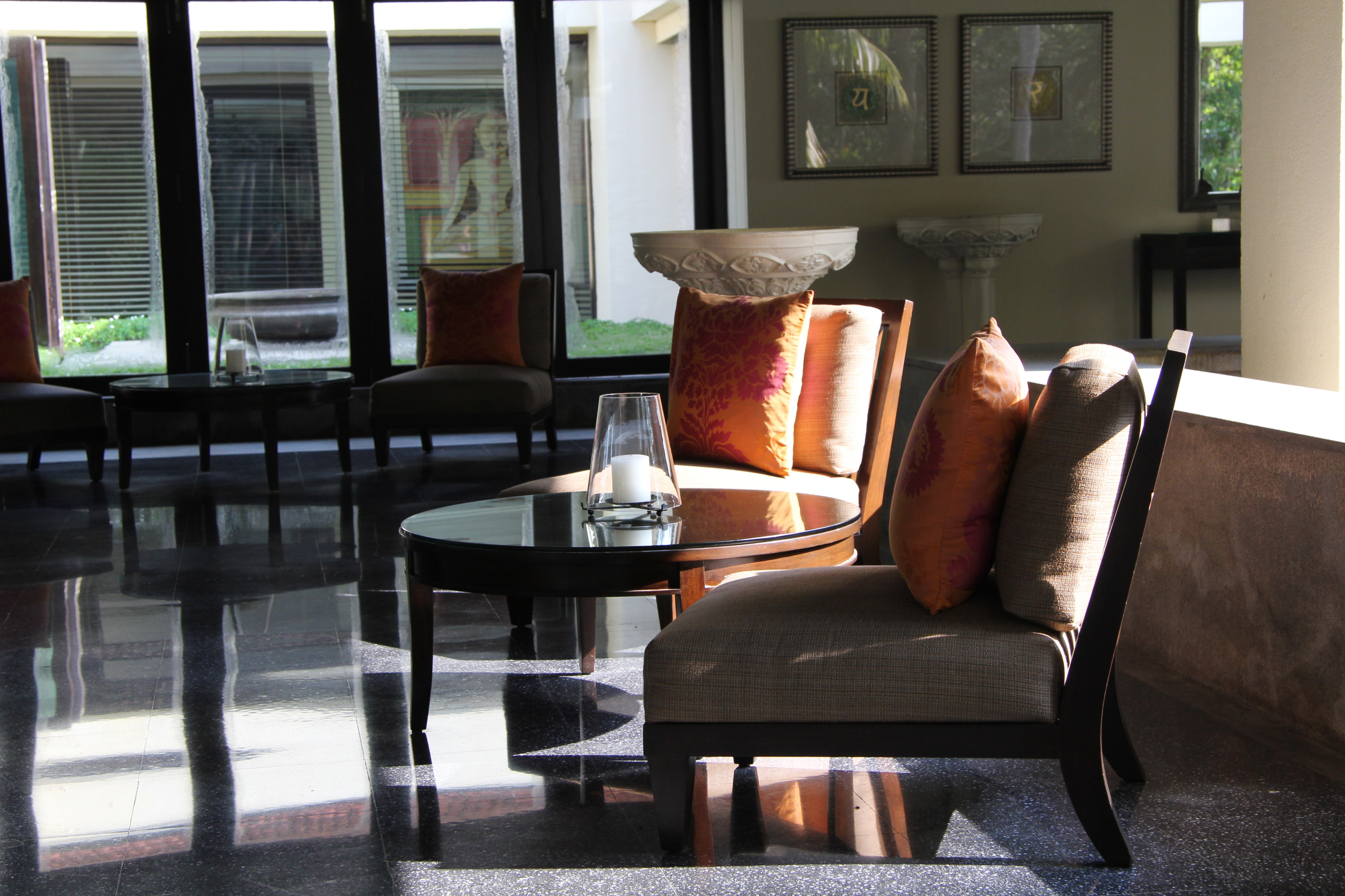 Interior seating area with chairs and tables HD Wallpaper