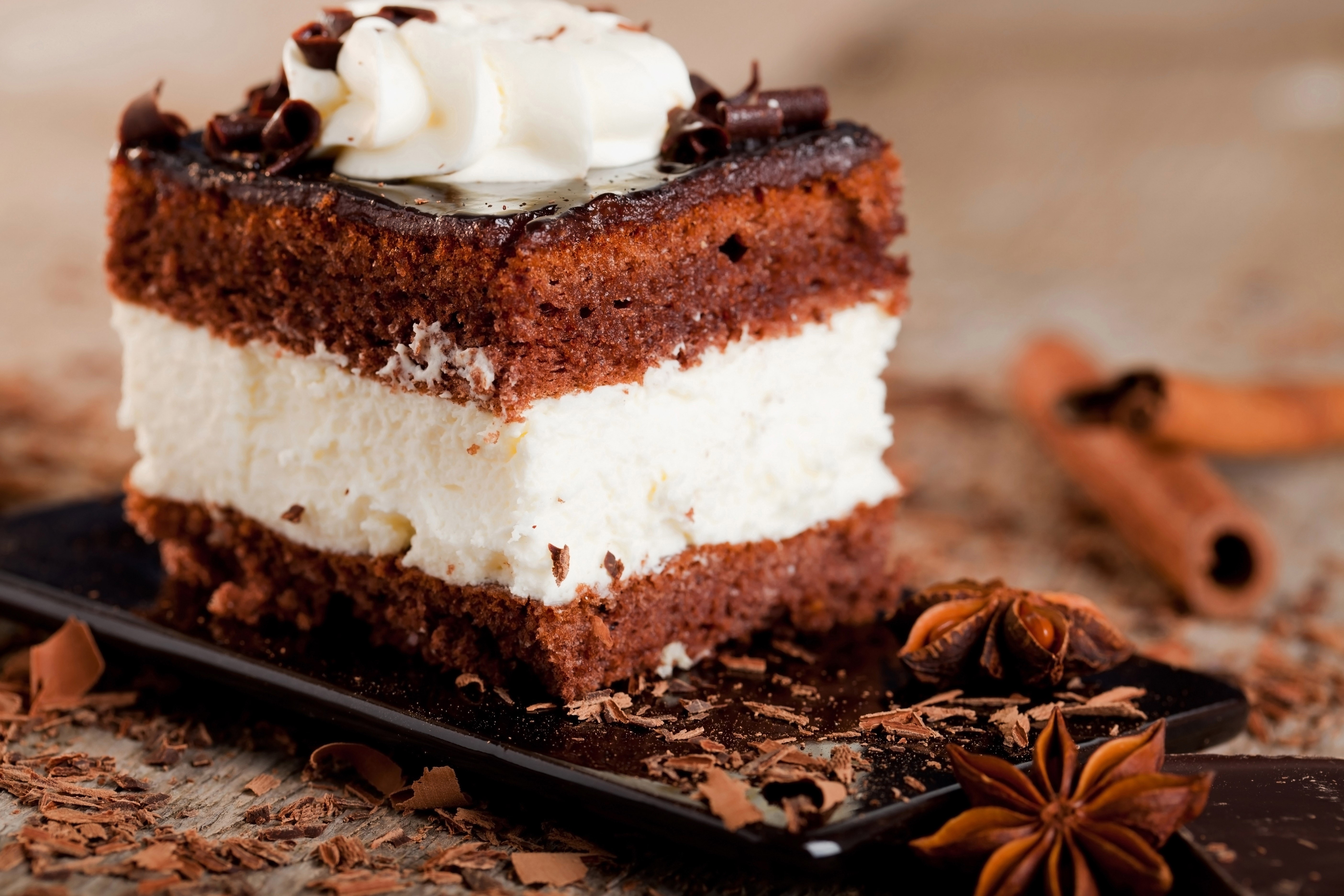 Chocolate cake with cream and chocolate shavings HD Wallpaper