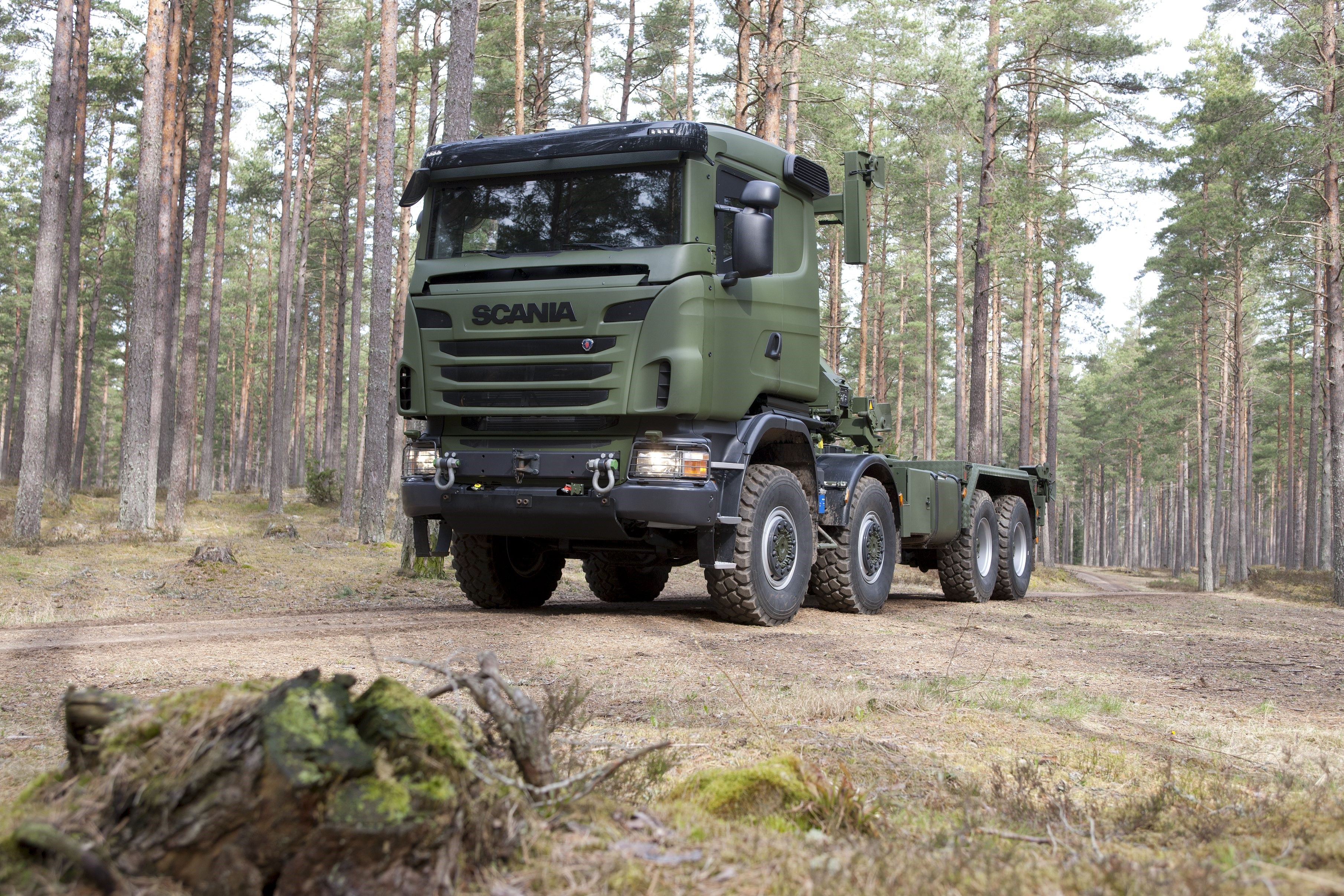 Scania R480 8x8 truck in a forest HD Wallpaper