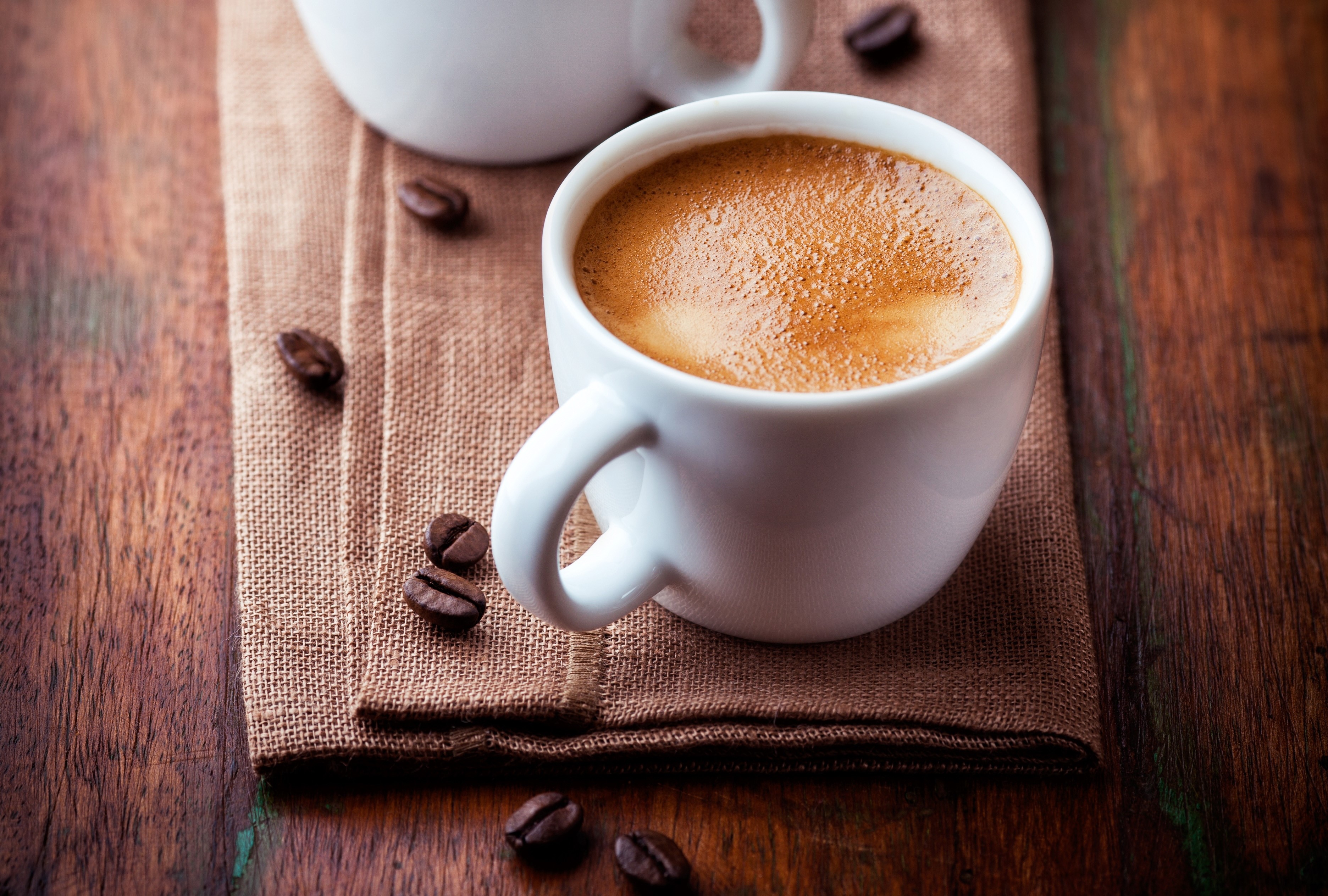 Espresso coffee cup with coffee beans HD Wallpaper
