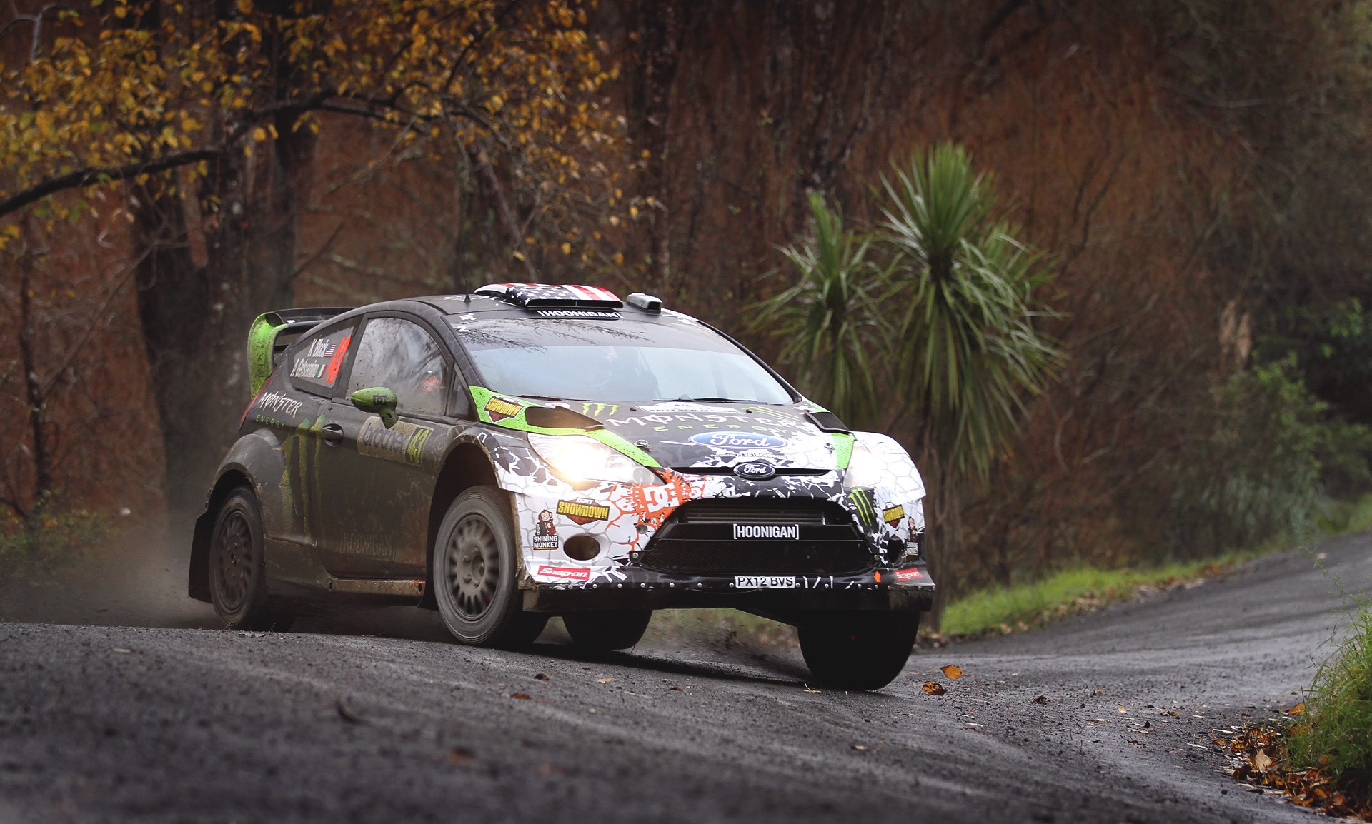 Ford Fiesta rally car driving on a dirt road HD Wallpaper