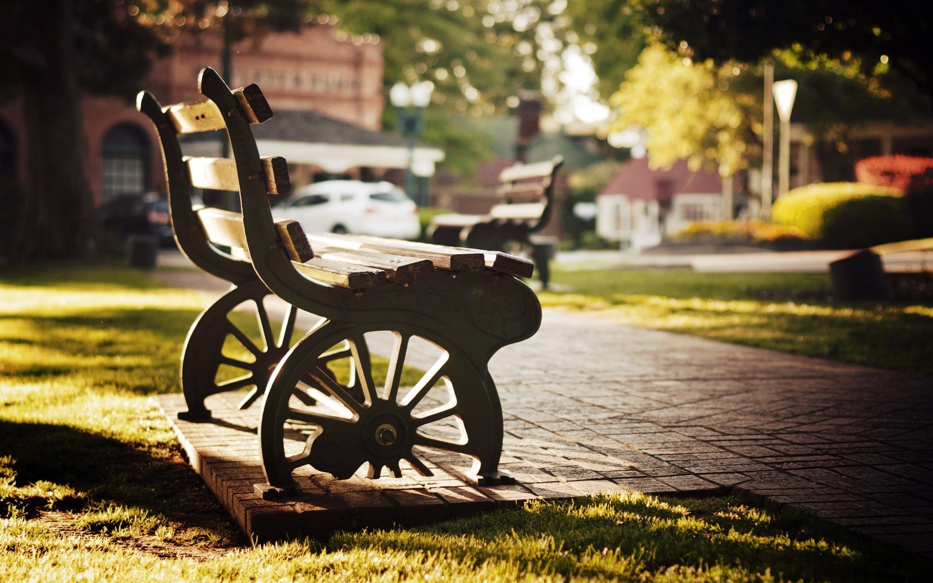 Park bench in sunlight HD Wallpaper