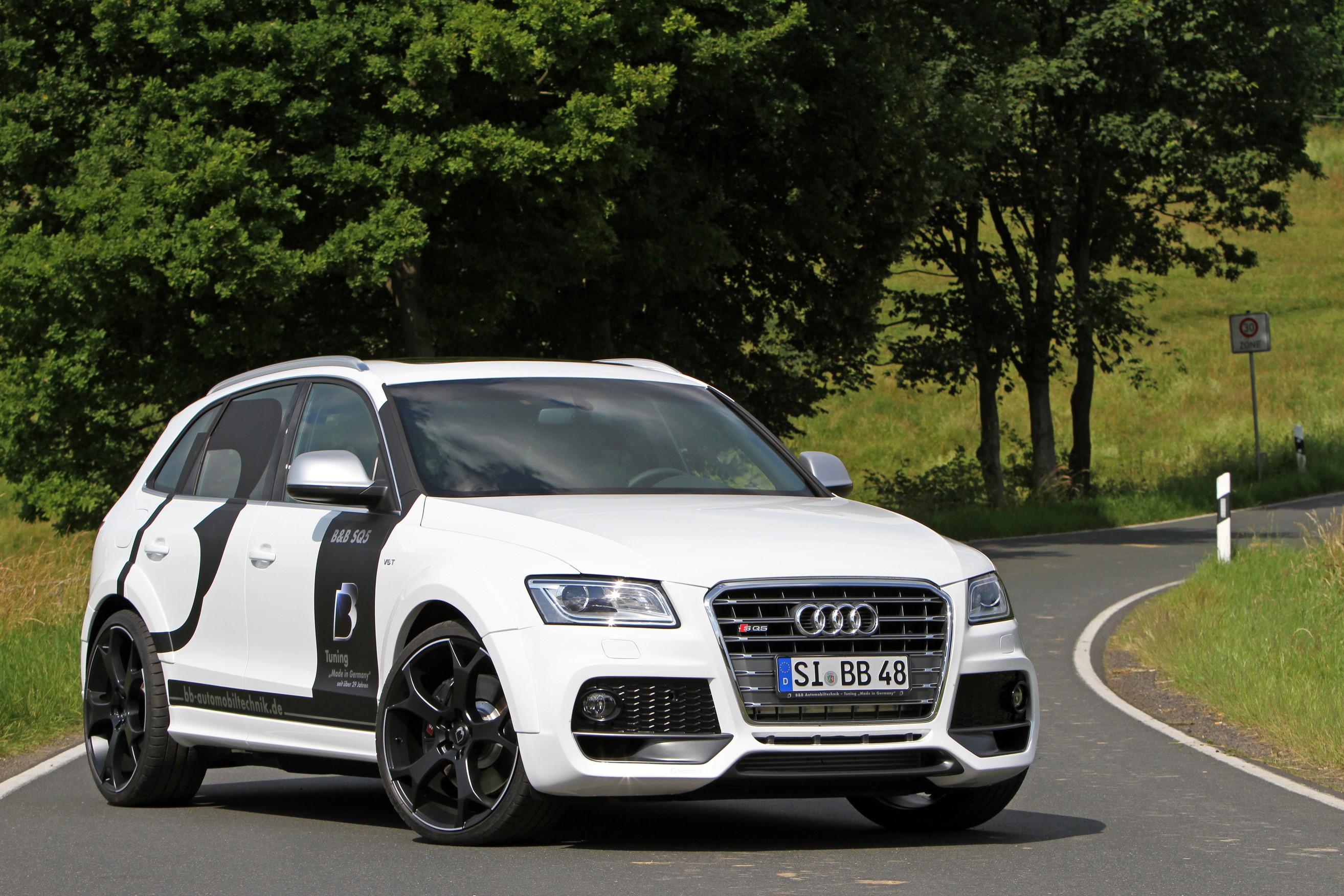 White Audi SQ5 on a winding road HD Wallpaper