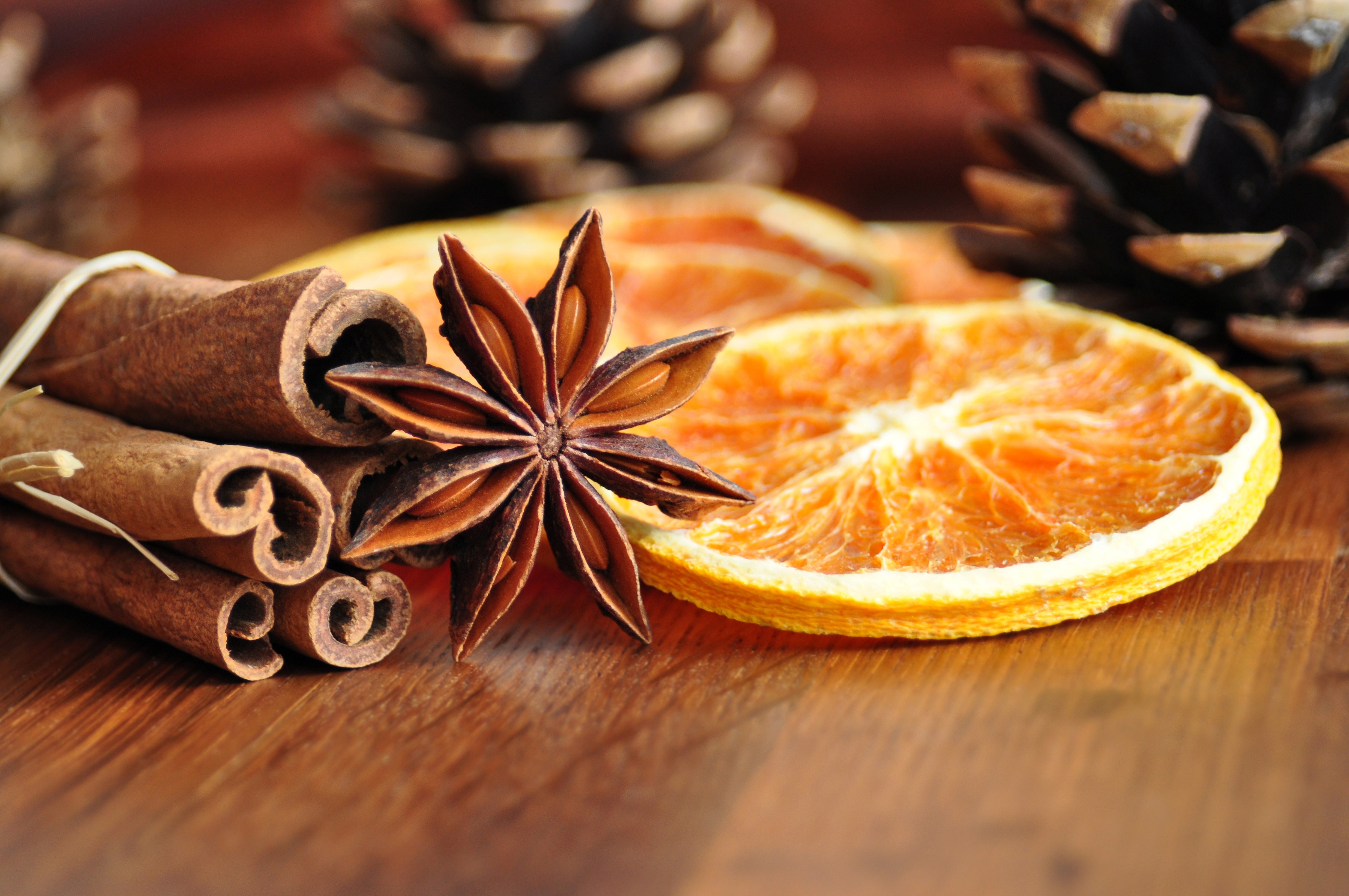 Cinnamon sticks, star anise, and dried orange slices HD Wallpaper