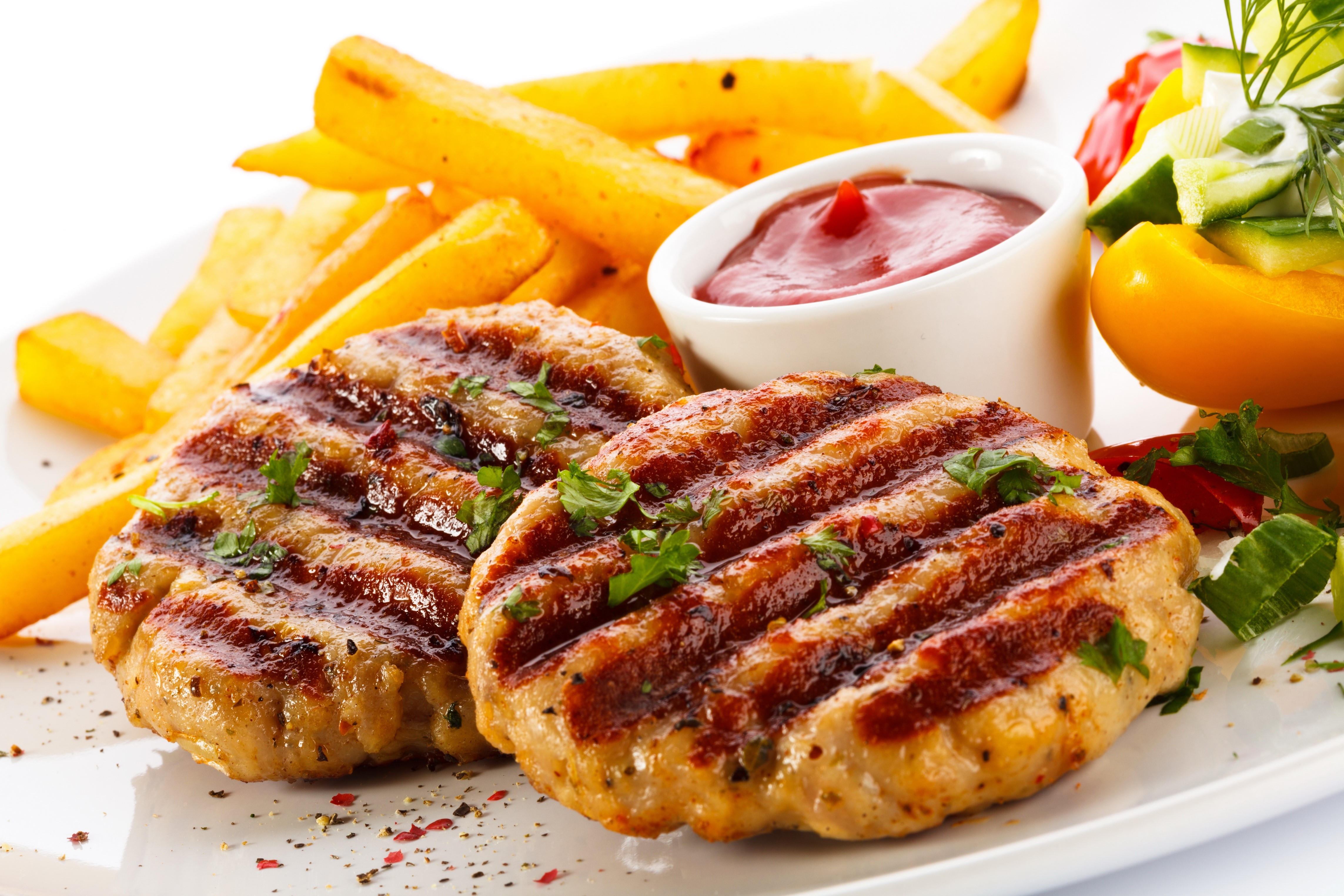 Grilled meat patties with french fries and ketchup HD Wallpaper