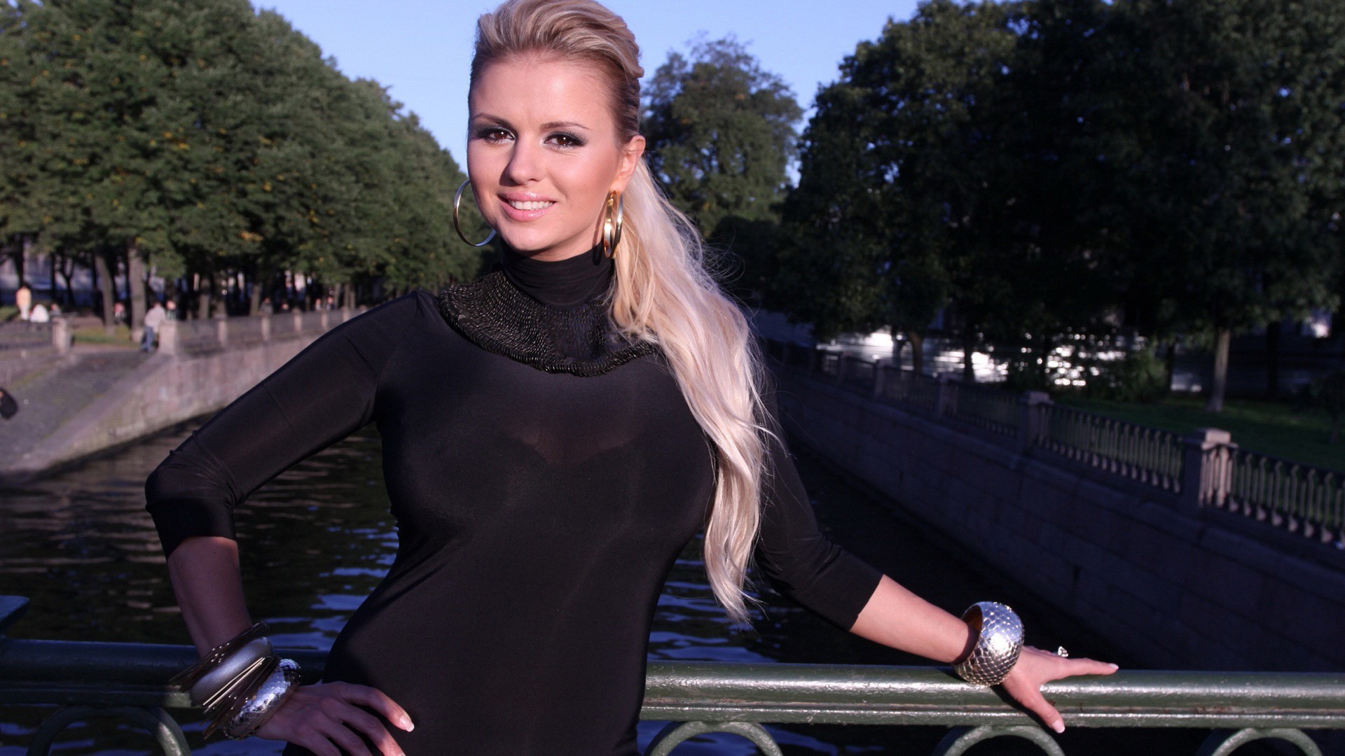 Anna Semenovich posing by a canal HD Wallpaper
