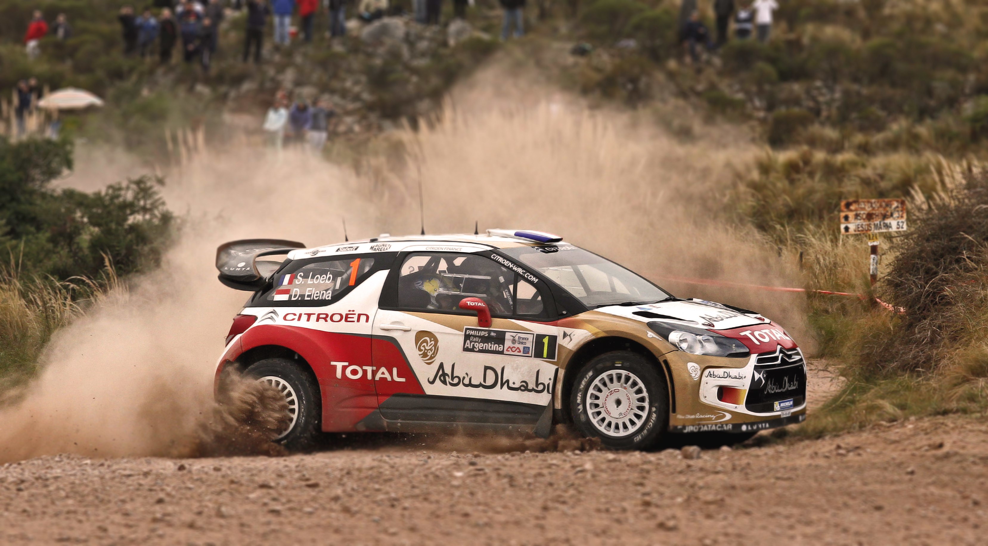 Sebastien Loeb's Citroen DS3 WRC car on a dirt track HD Wallpaper