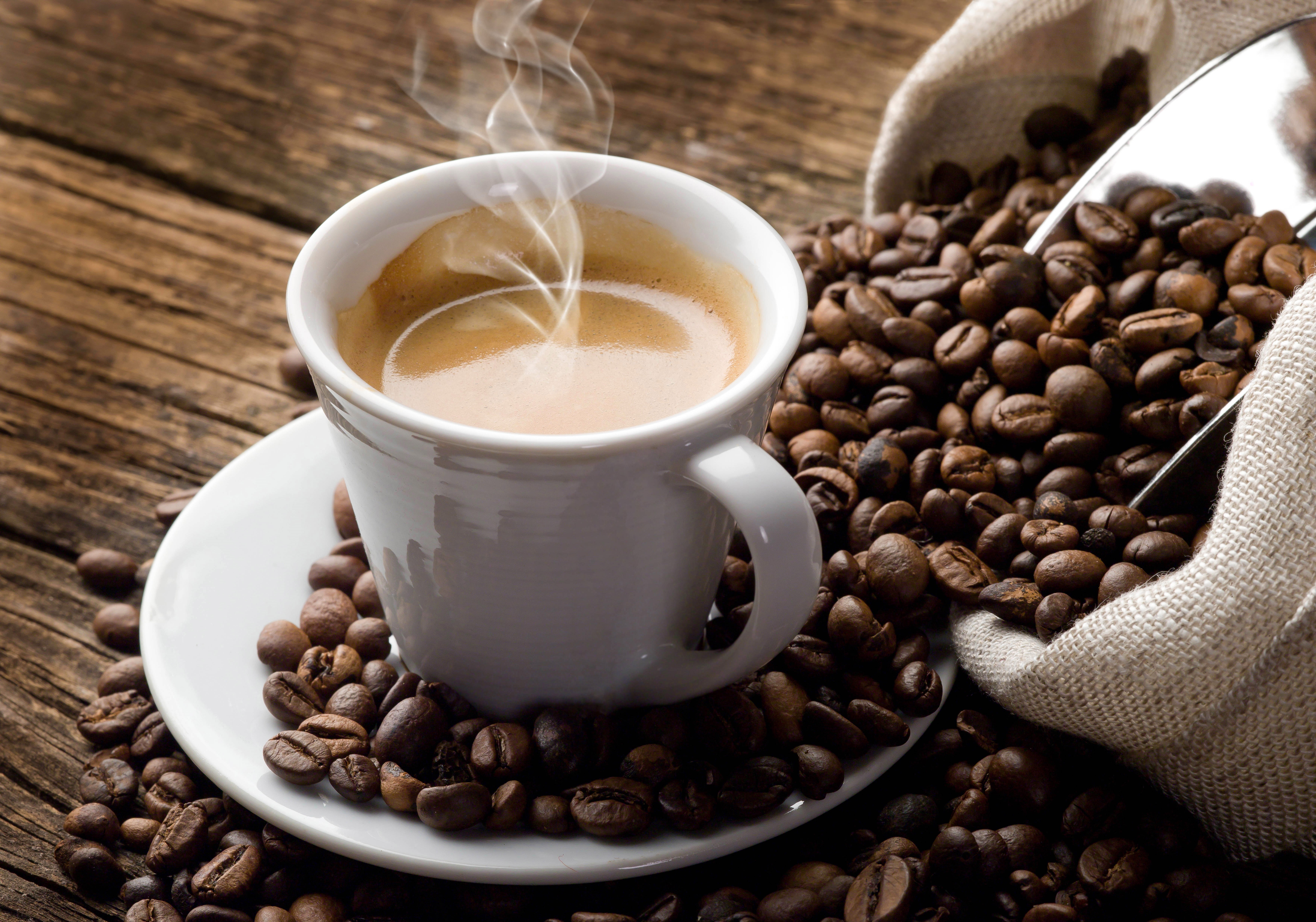 Cup of Coffee with Coffee Beans HD Wallpaper