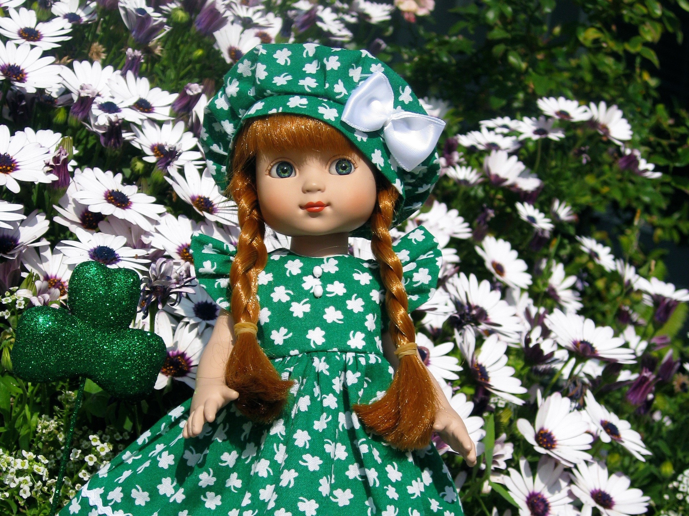 Doll in green dress with shamrocks and flowers HD Wallpaper