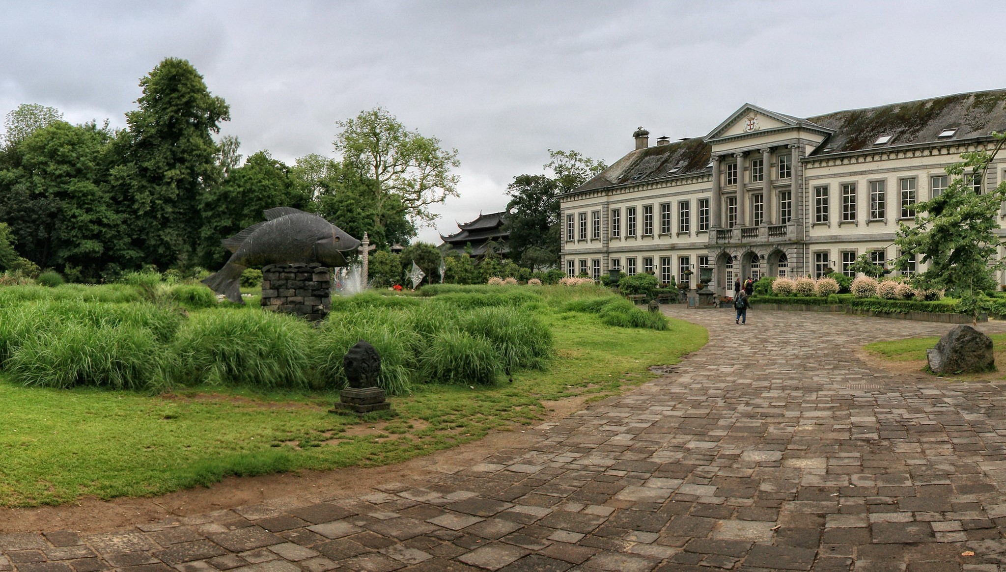 Pairi Daiza castle with fish sculpture and gardens HD Wallpaper