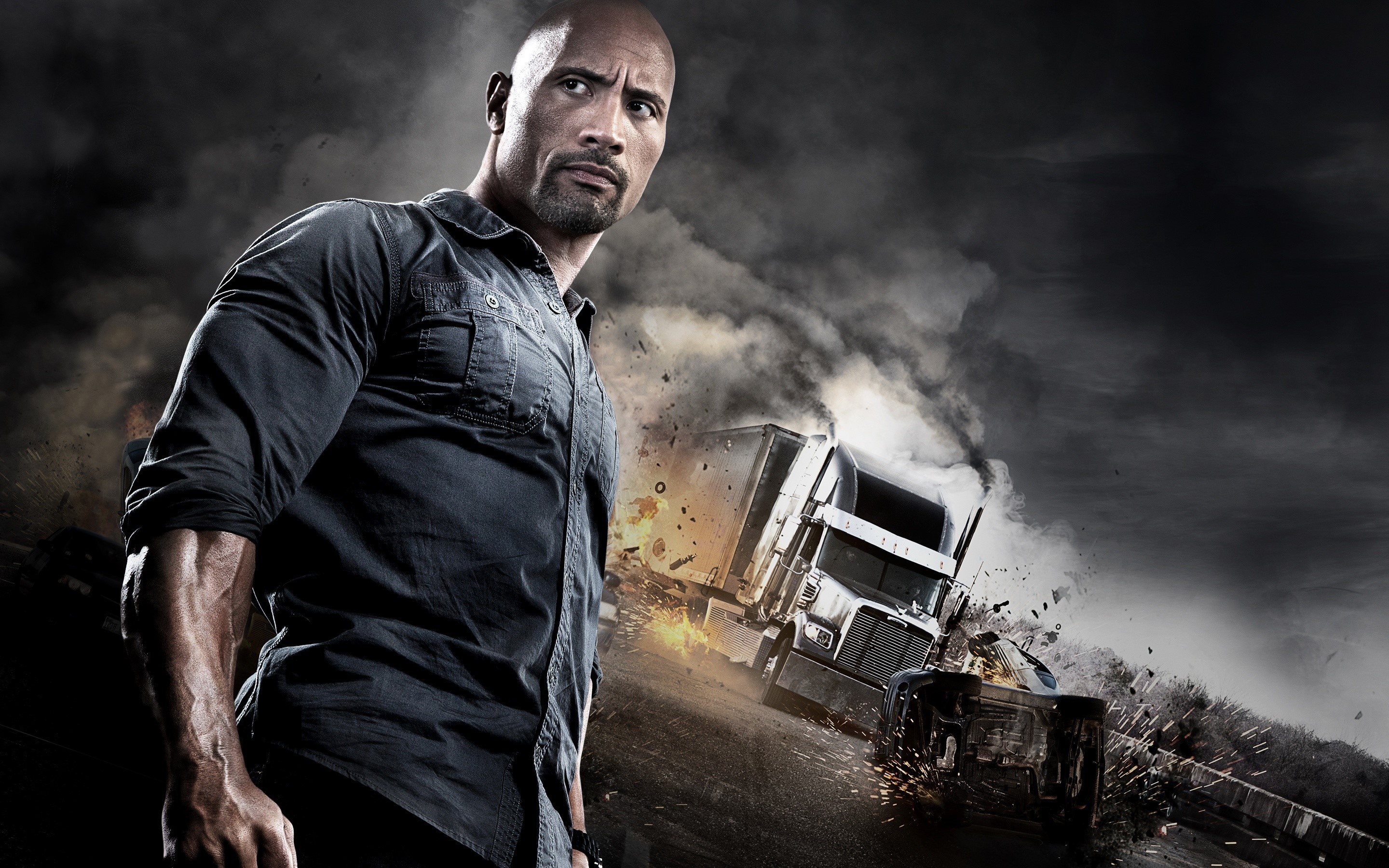 Dwayne Johnson in front of a truck crash HD Wallpaper