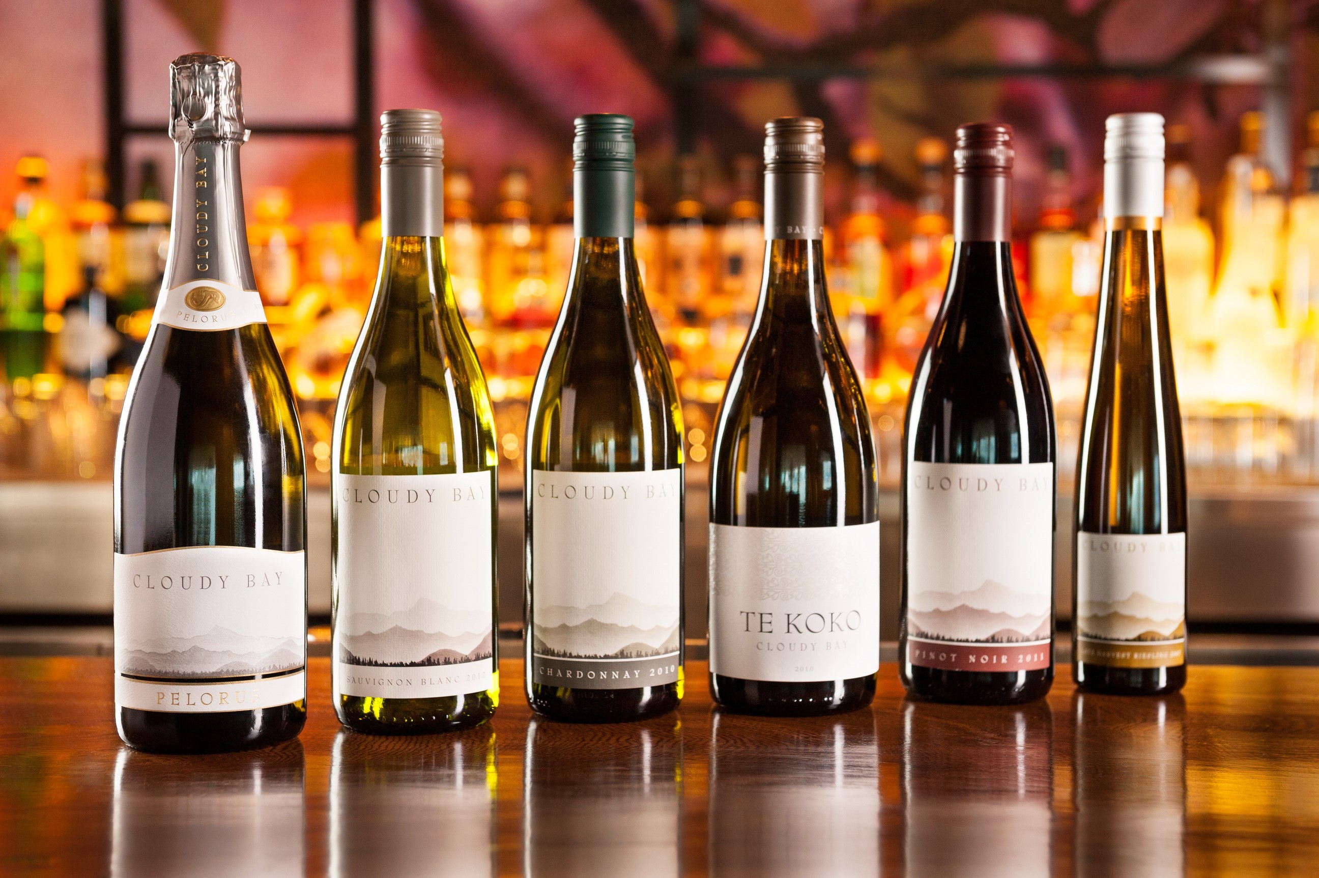 Cloudy Bay wine bottles on a bar HD Wallpaper