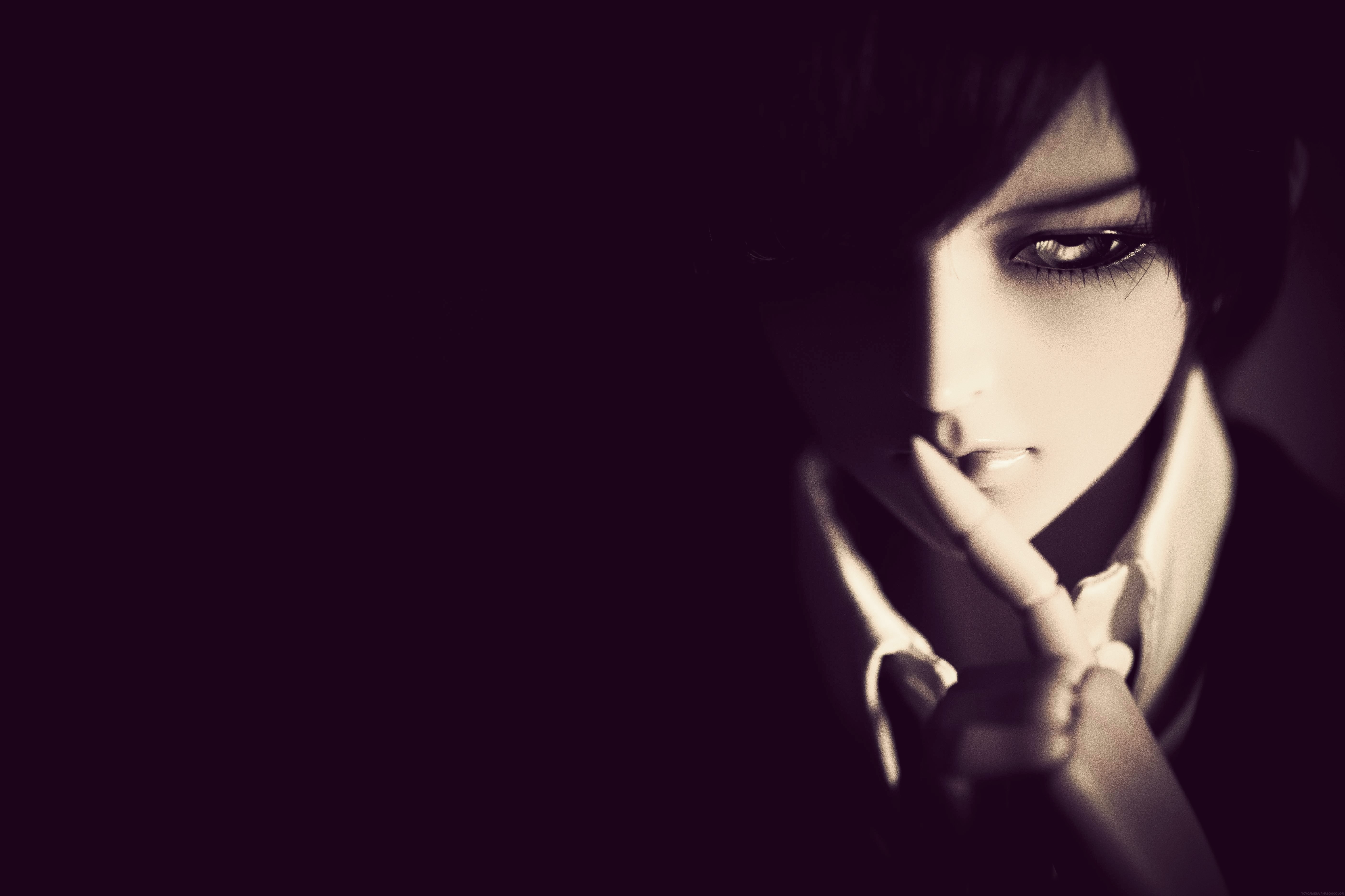 Doll with finger on lips HD Wallpaper