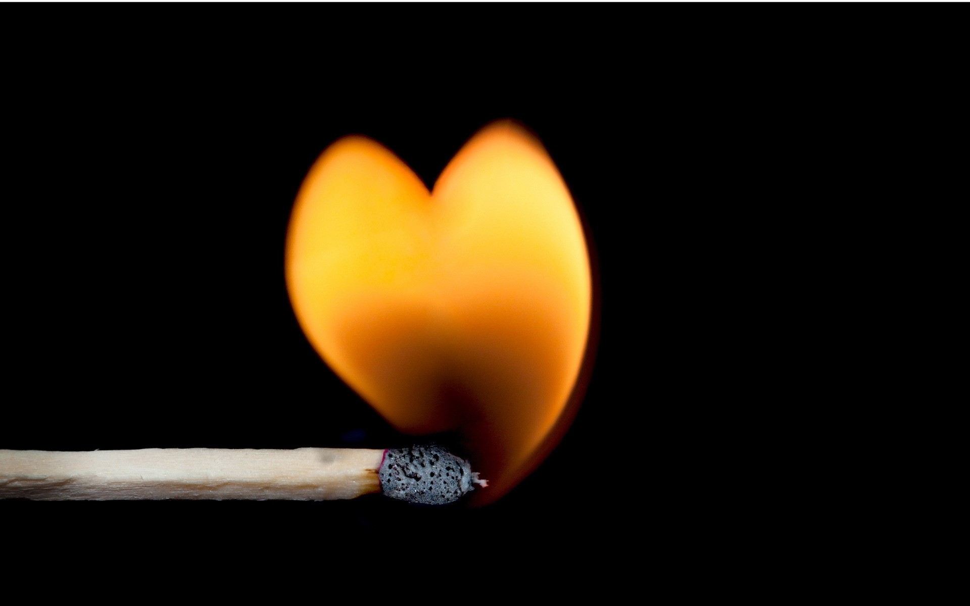 Burning match with heart-shaped flame HD Wallpaper
