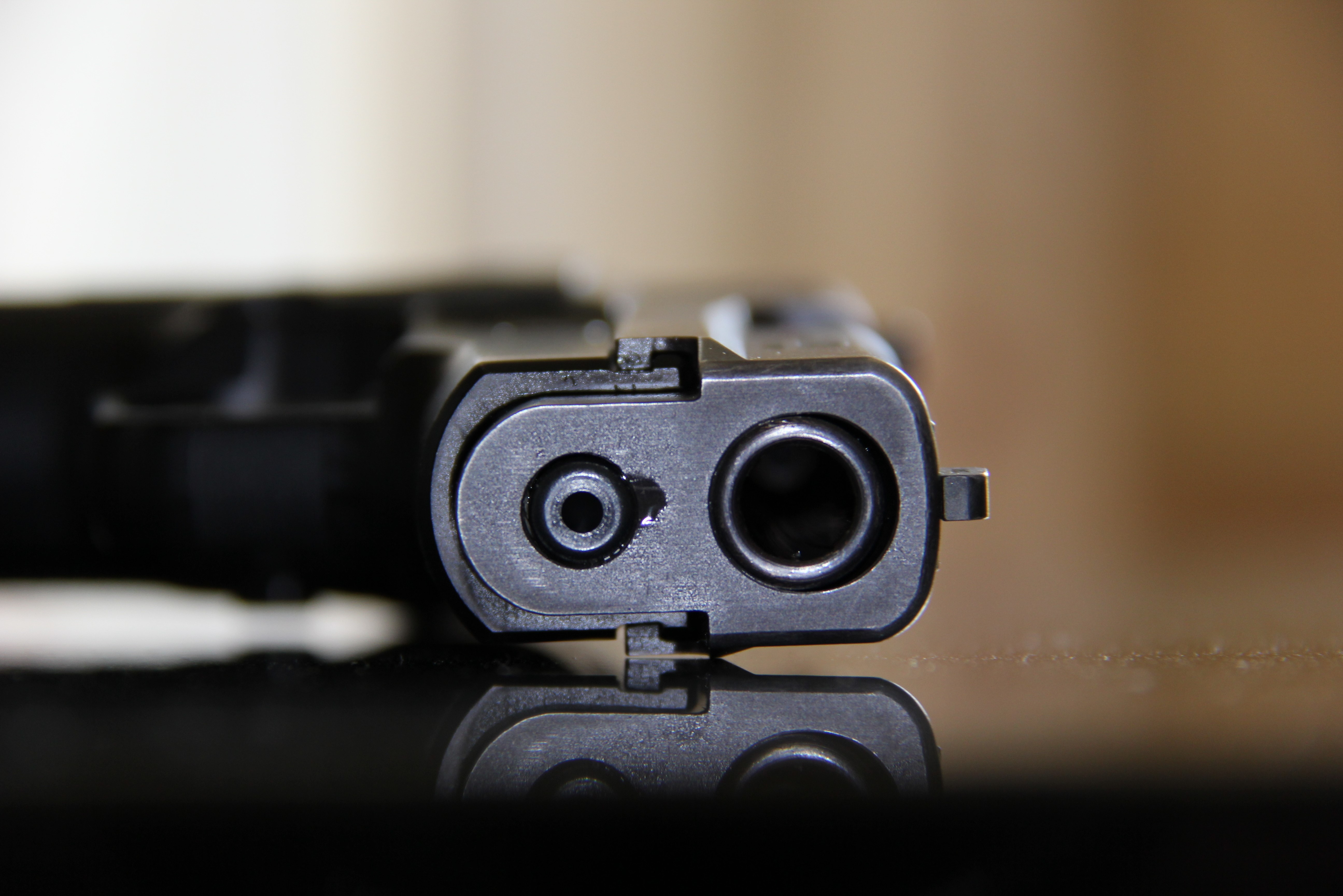 Closeup of a pistol barrel HD Wallpaper