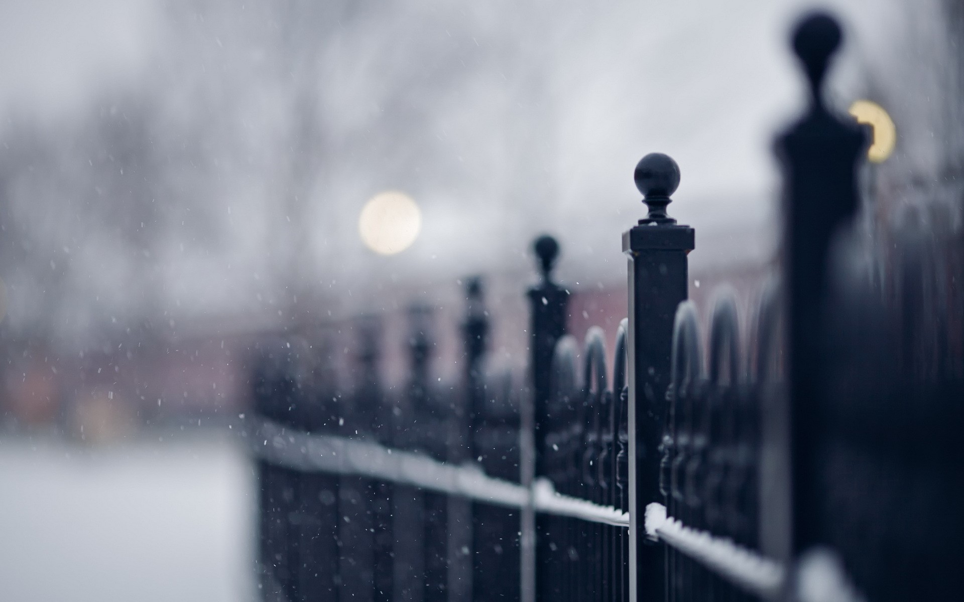 Winter fence with falling snow HD Wallpaper