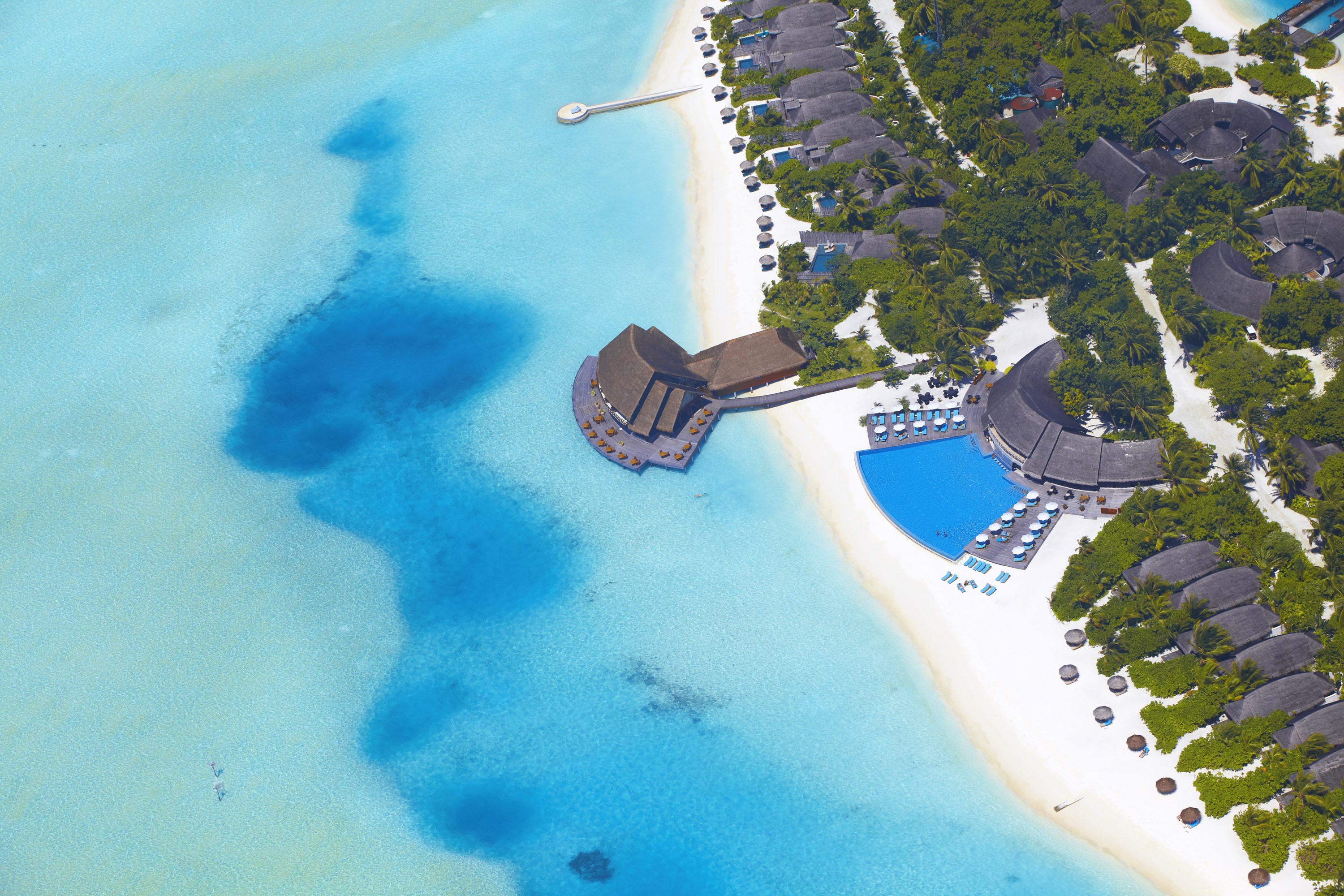 Aerial view of a tropical resort in the Maldives HD Wallpaper