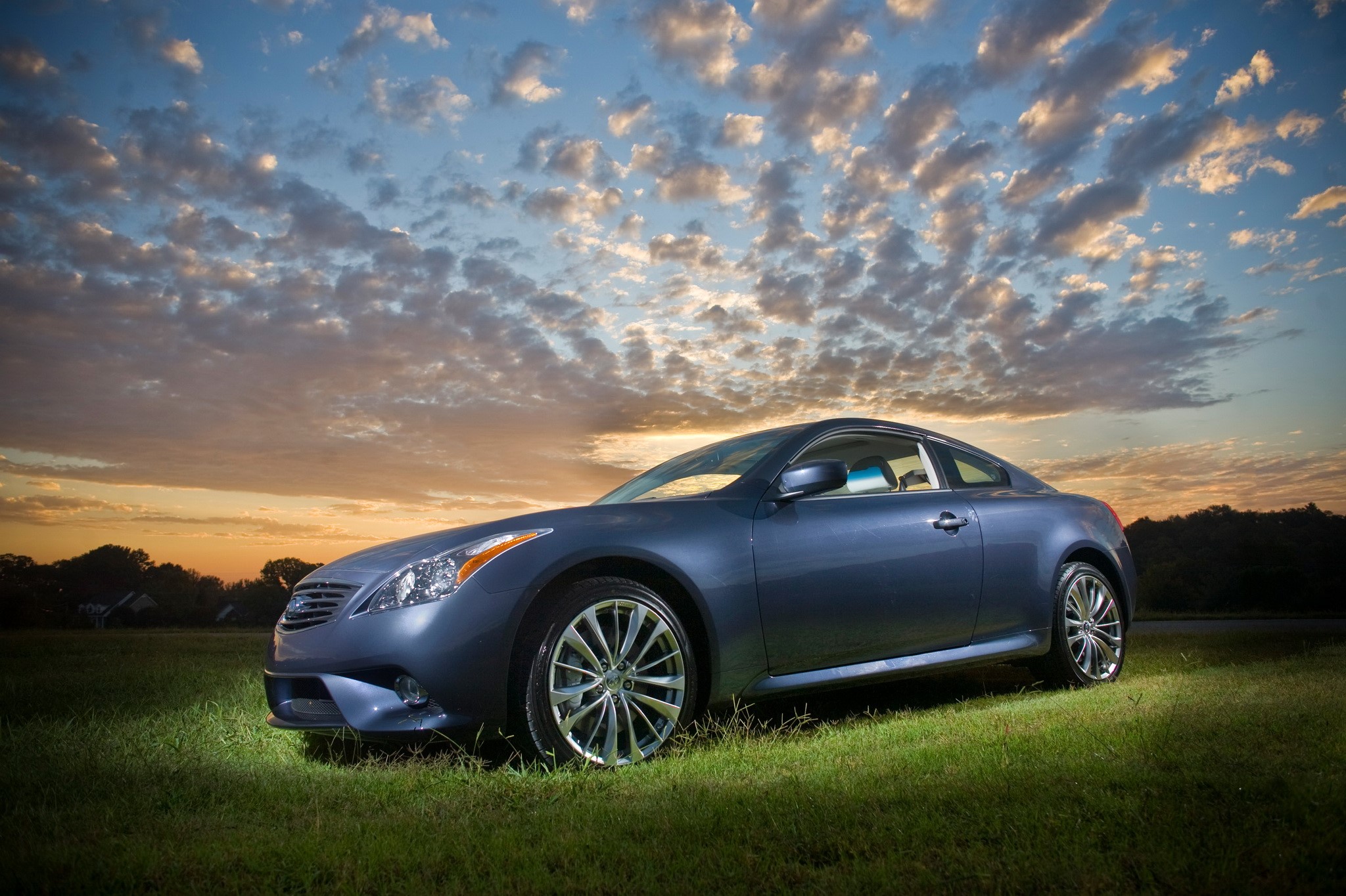 Blue Infiniti G37 Coupe AWD Sport on grass at sunset HD Wallpaper