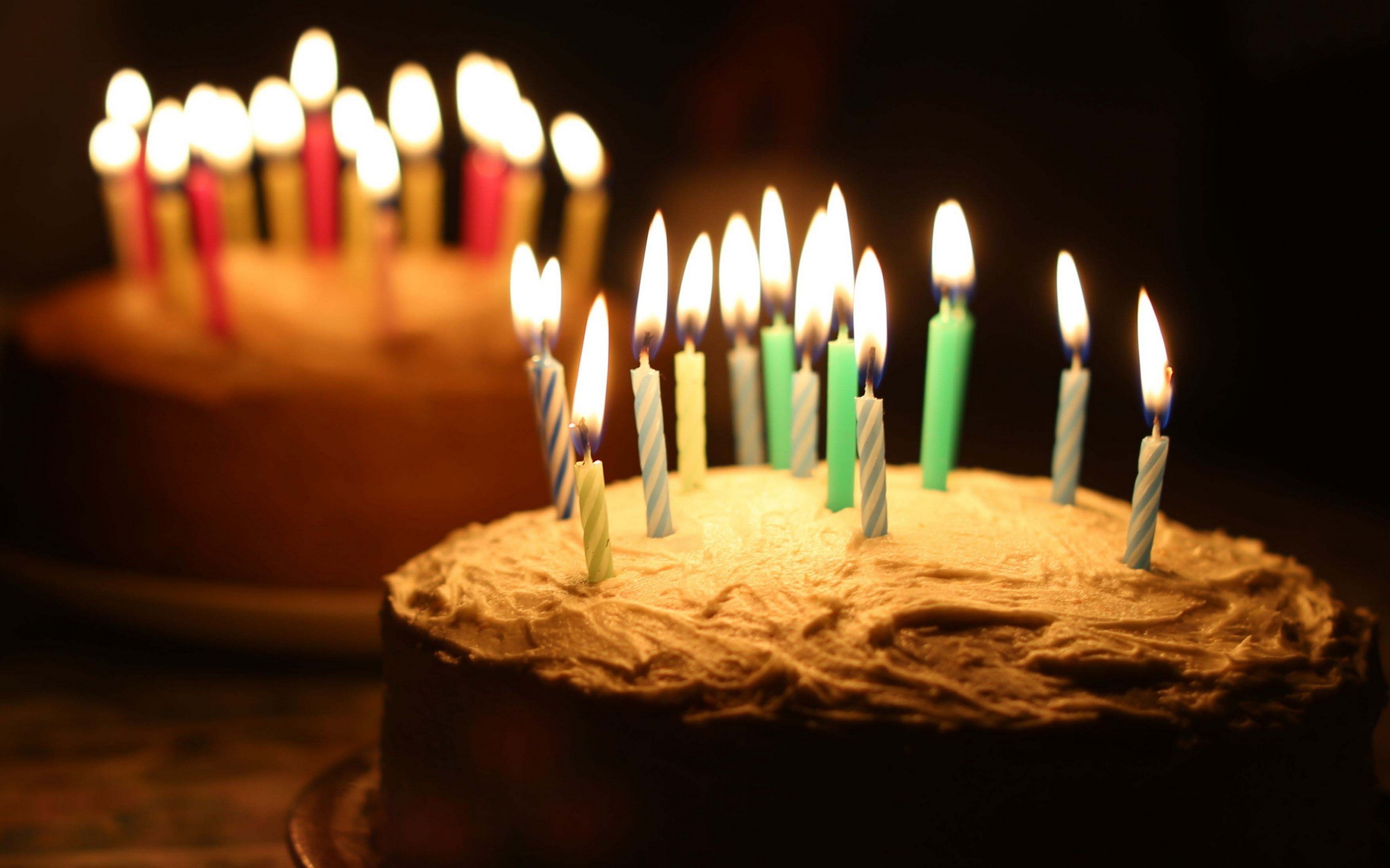 Birthday cakes with lit candles HD Wallpaper