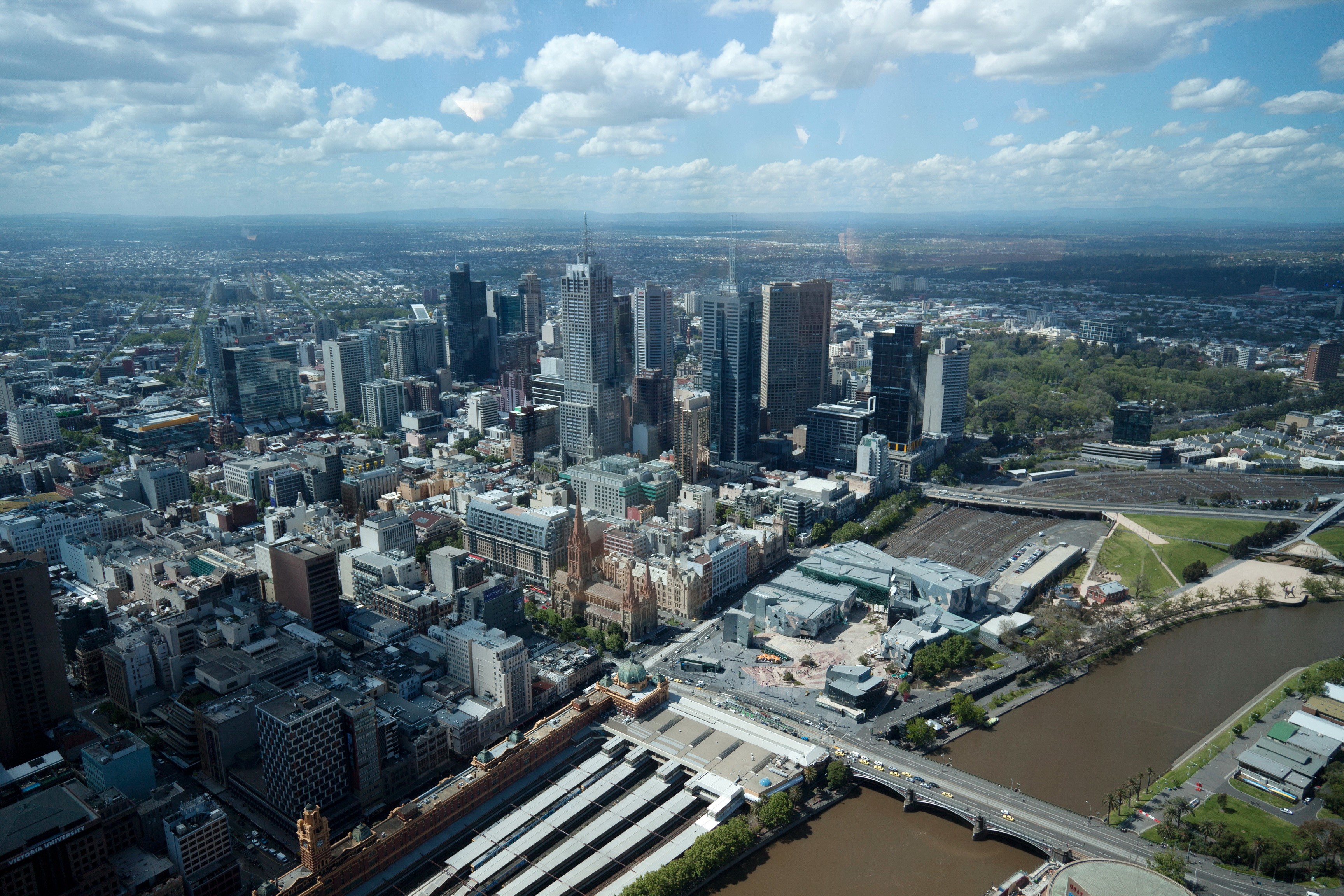 Melbourne cityscape with skyscrapers and Yarra River from above HD Wallpaper