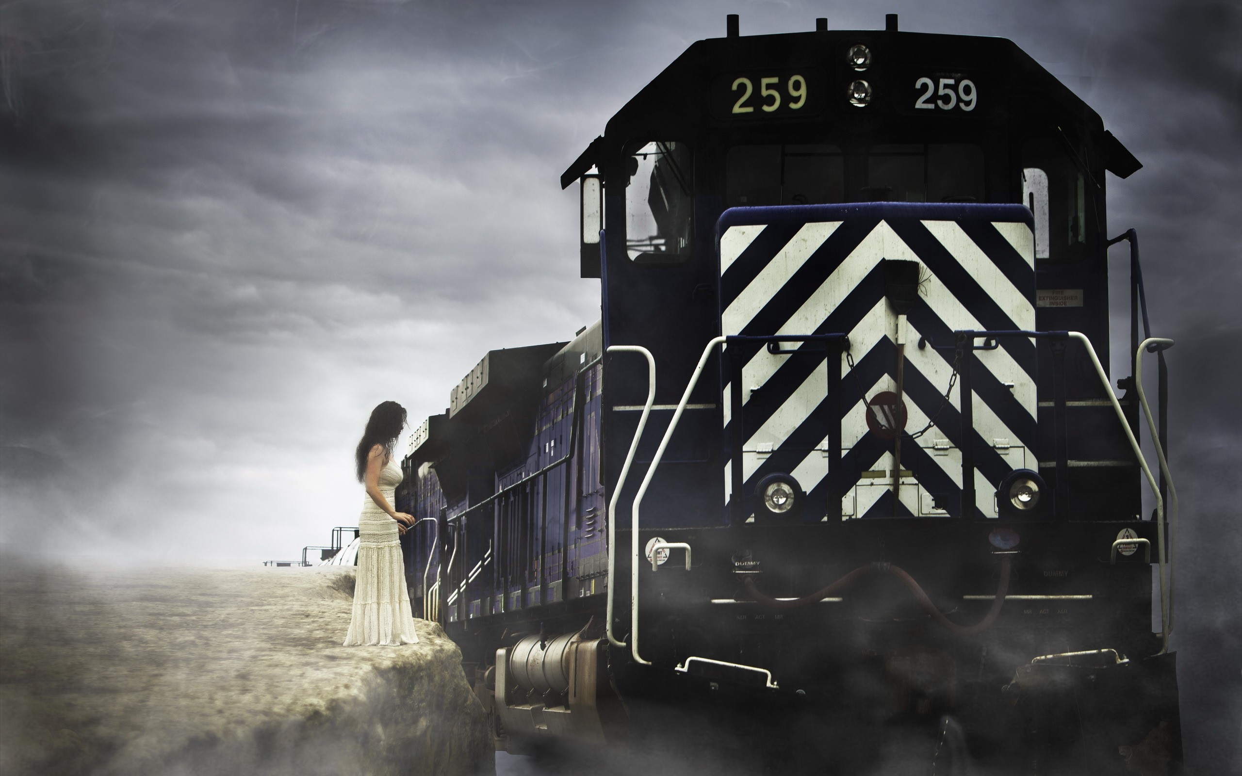 Woman in white dress standing next to a train HD Wallpaper