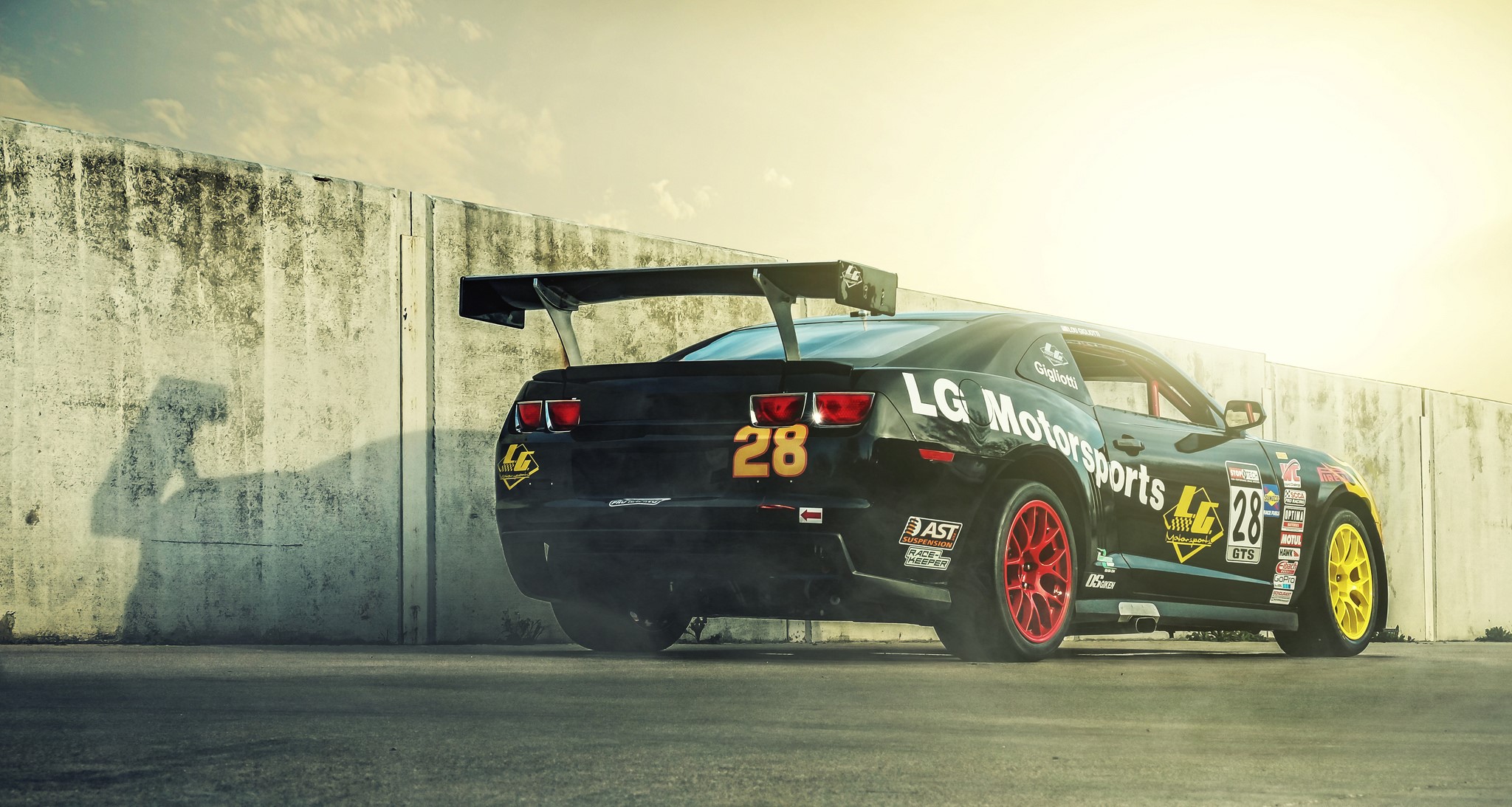 Black Chevrolet Camaro LG Motorsports race car with number 28 HD Wallpaper