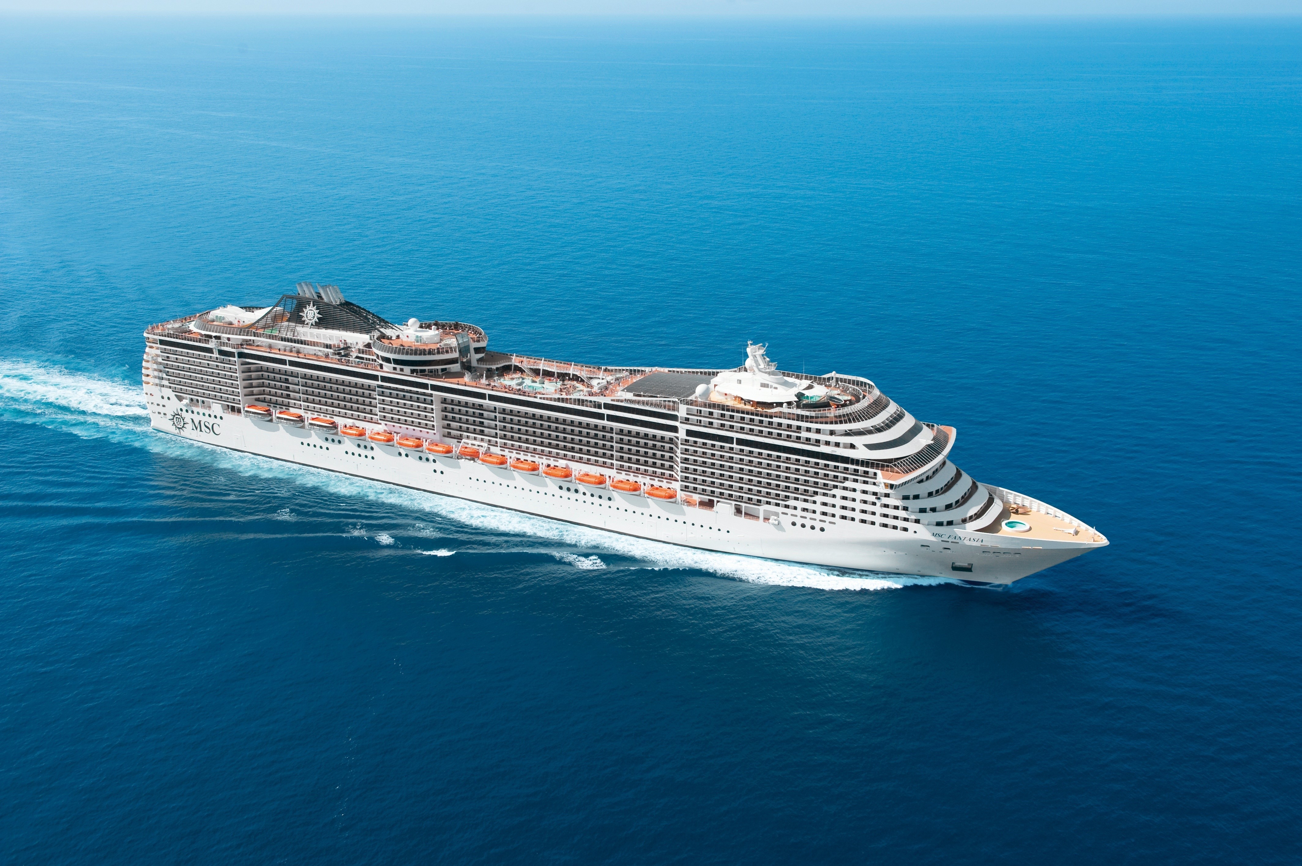 MSC Fantasia cruise liner sailing on the sea HD Wallpaper